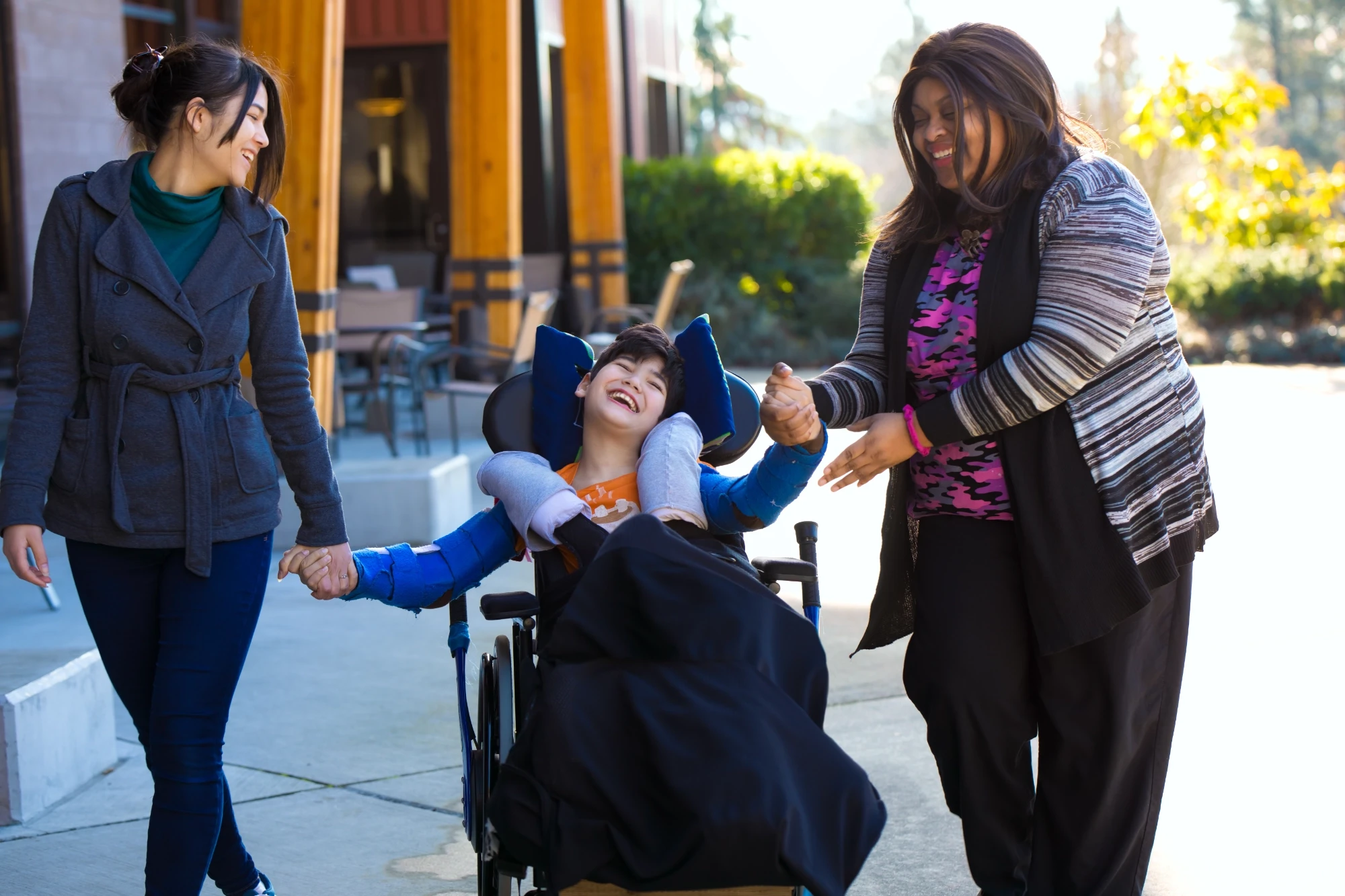 girl in wheelchair smiling