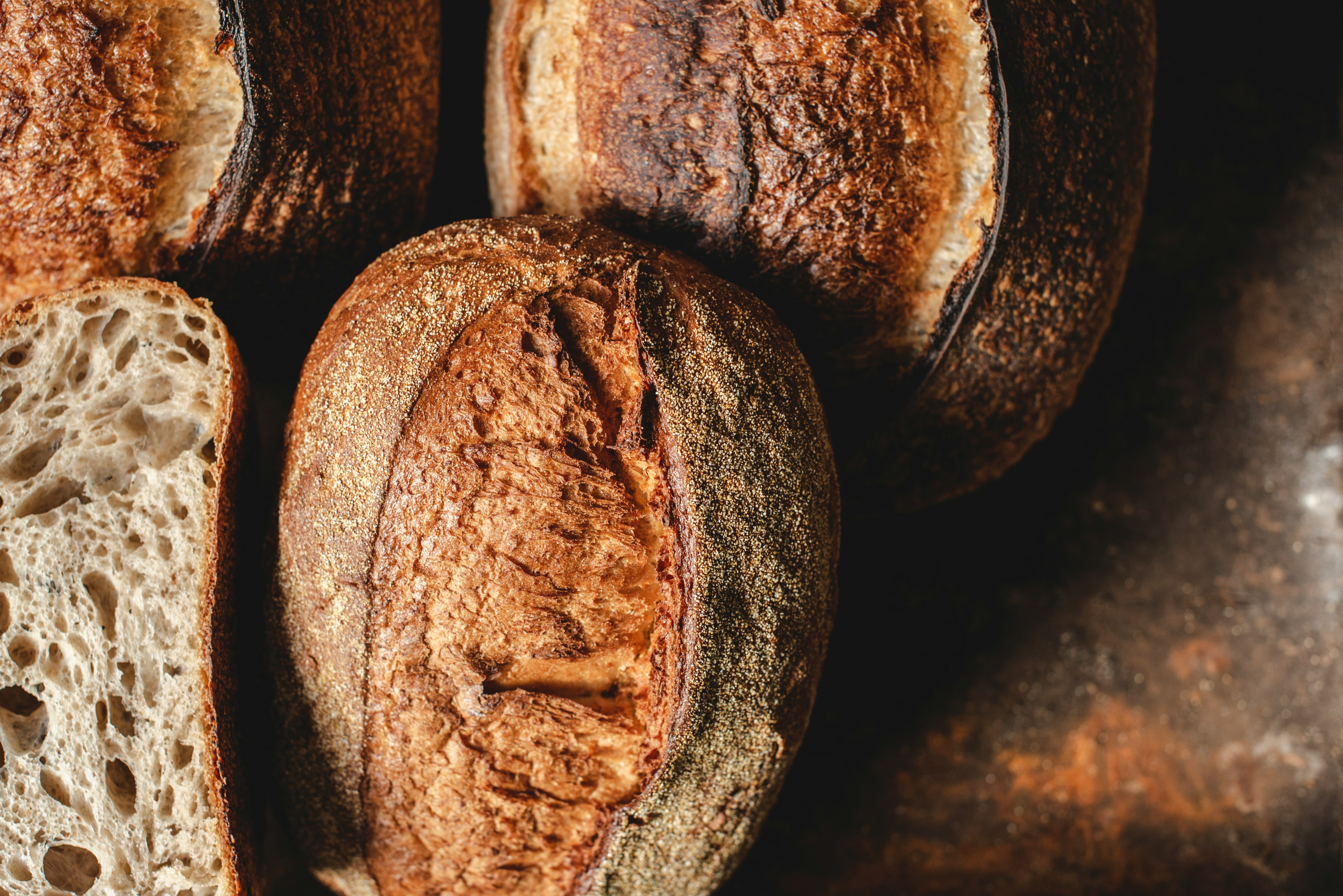 Loaves of freshly baked sourdough bread.