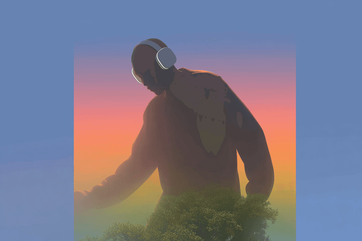 Silhouetted person wearing headphones at sunset landscape