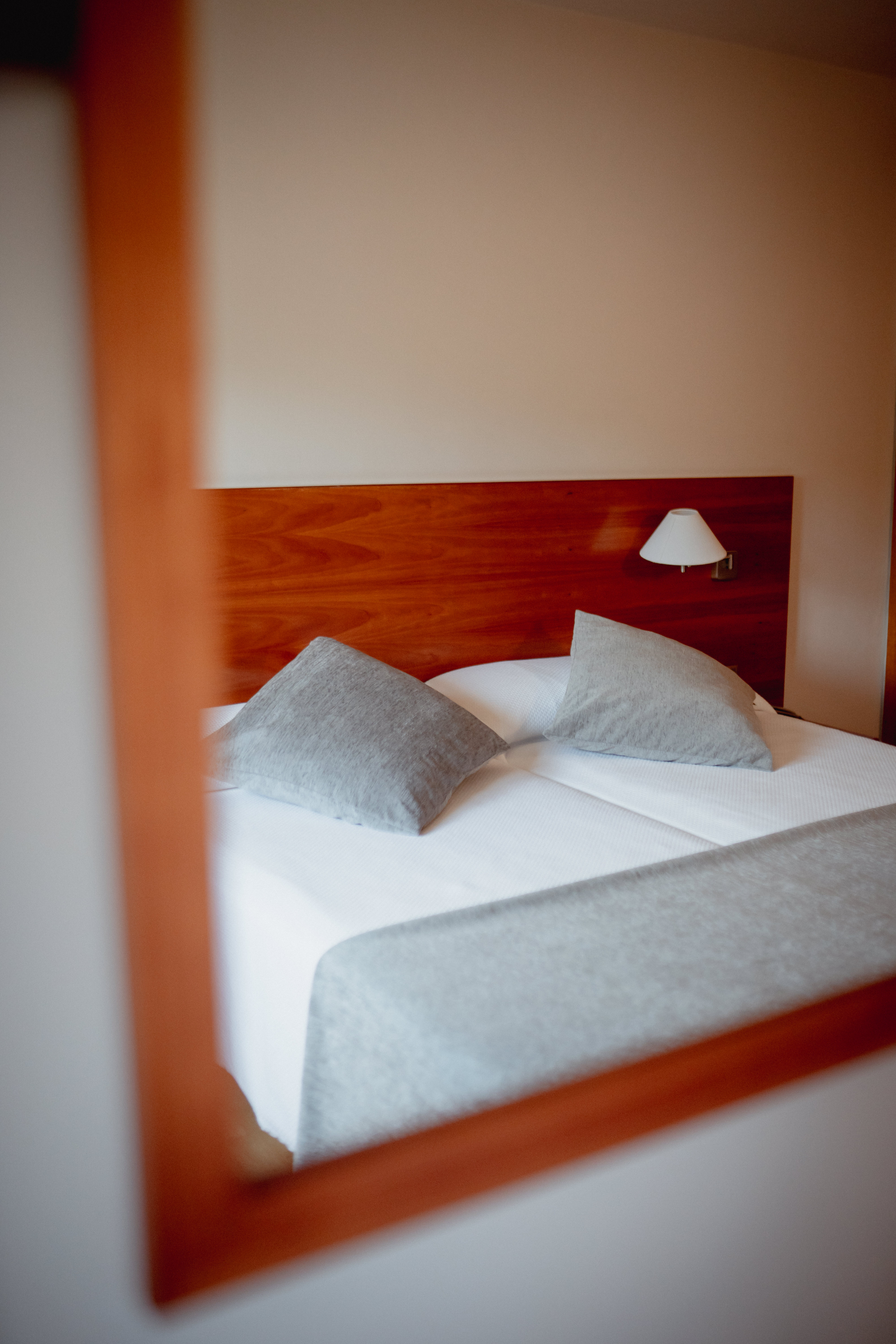 Minimalistic style bathroom with blue walls and marble floor