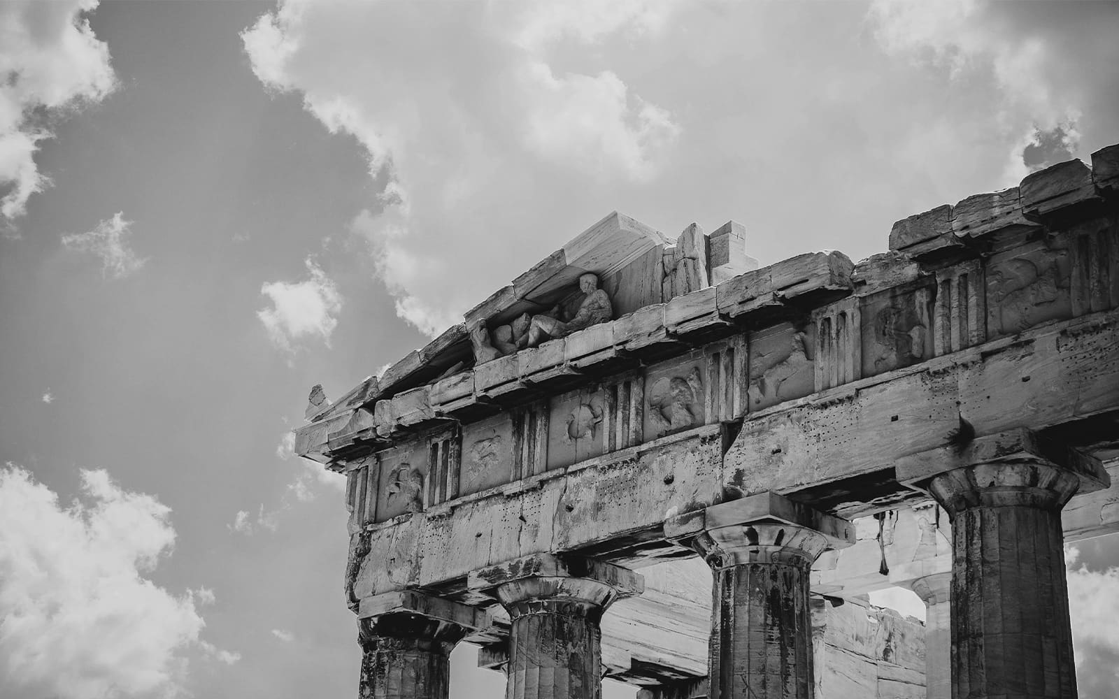 Black and white image of the Parthenon in Greece showing architectural details and columns.