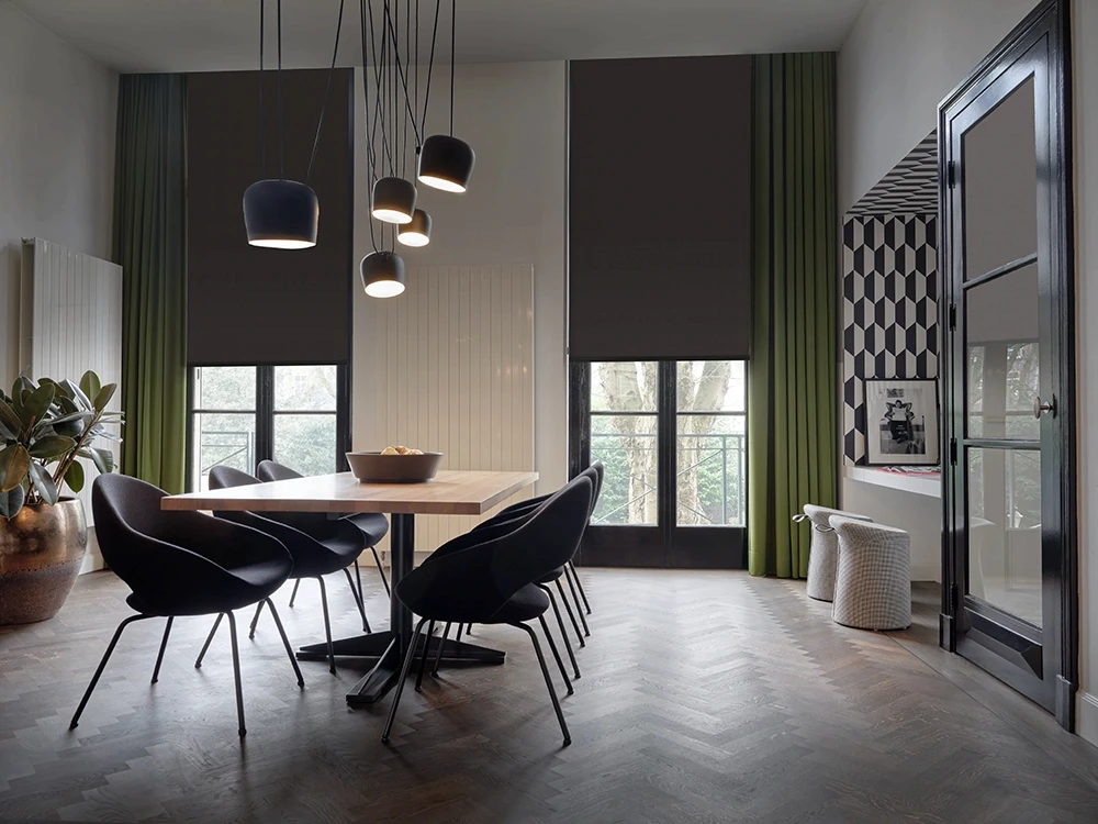 Dining room with motorised roller blinds and curtains
