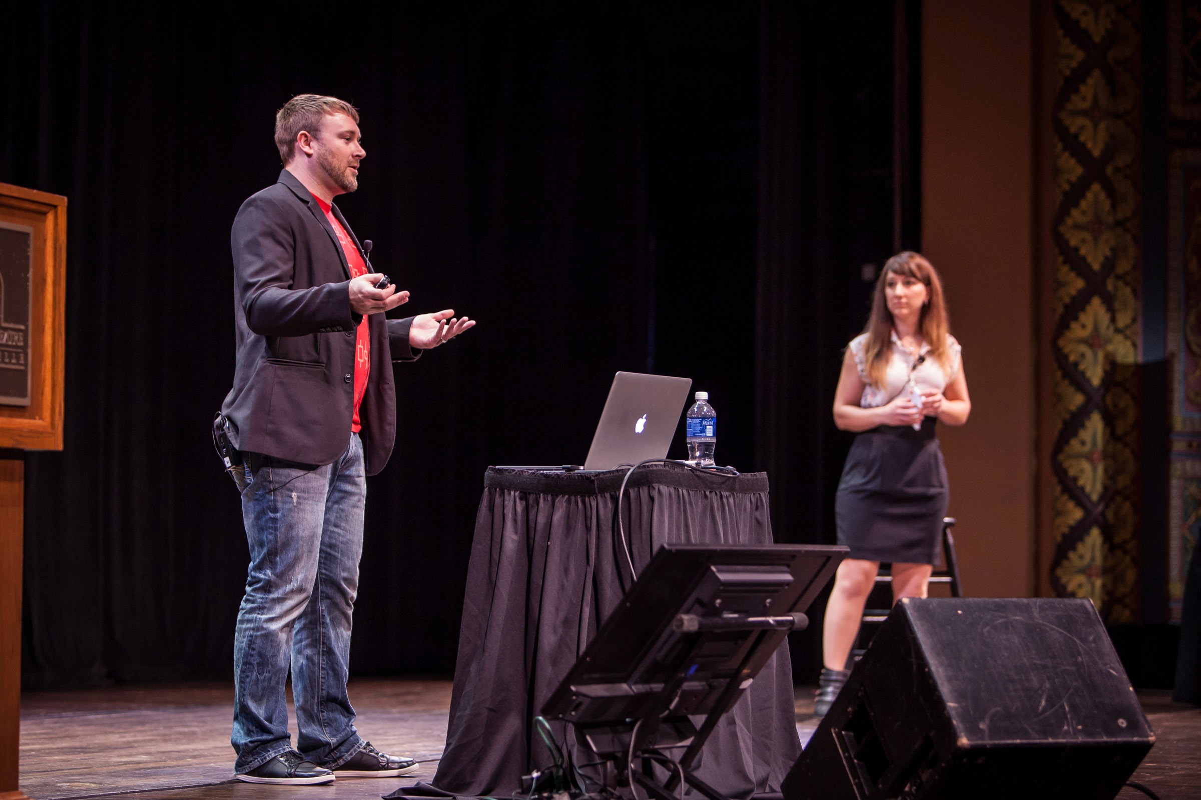 Patrick Haney speaking on stage at ConvergeFL