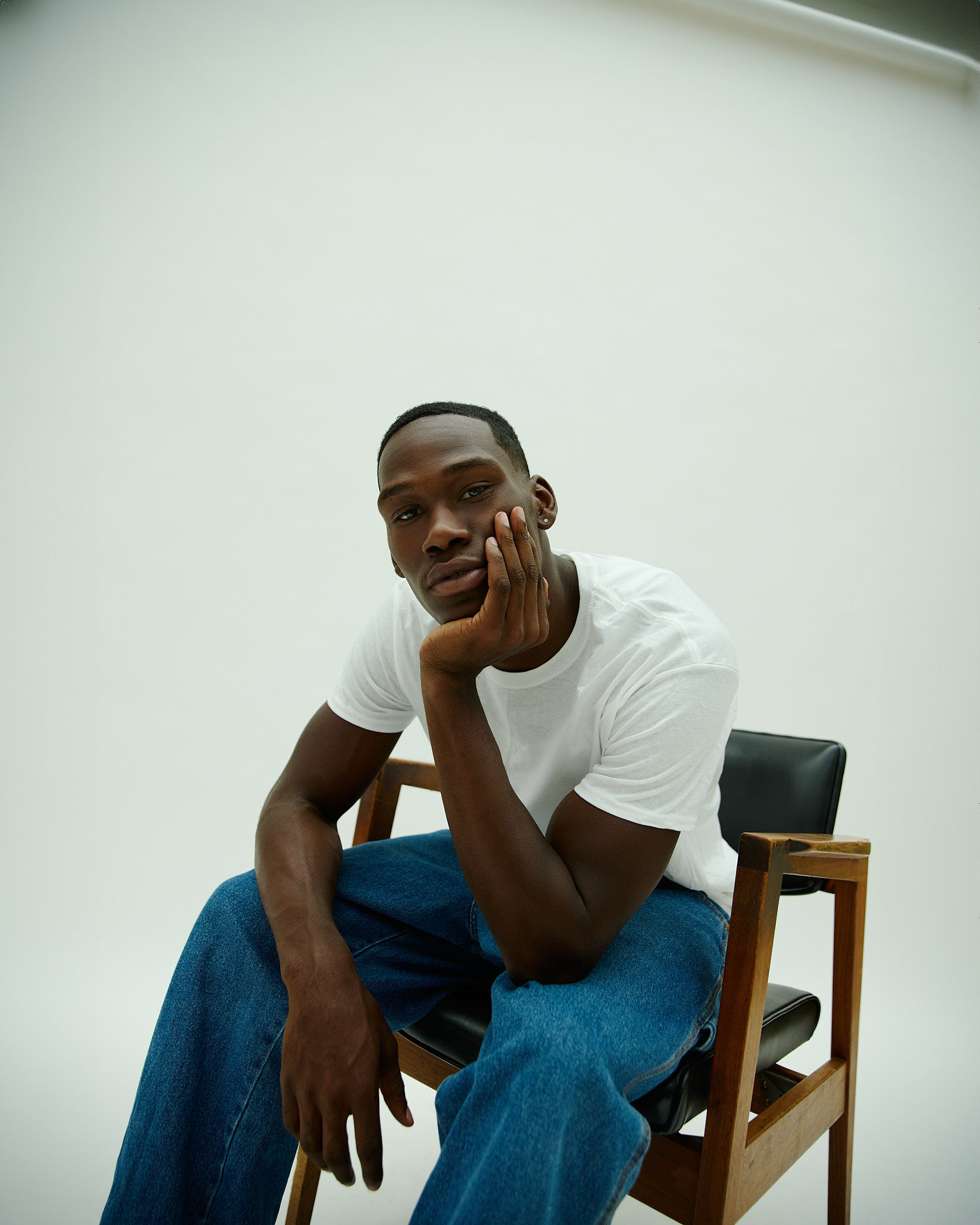 Woman walking on a curved pavement with shadow.
