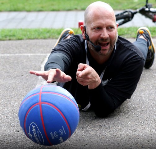 person sitting in a chair in front of a man