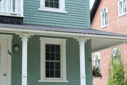 white and brown brick house