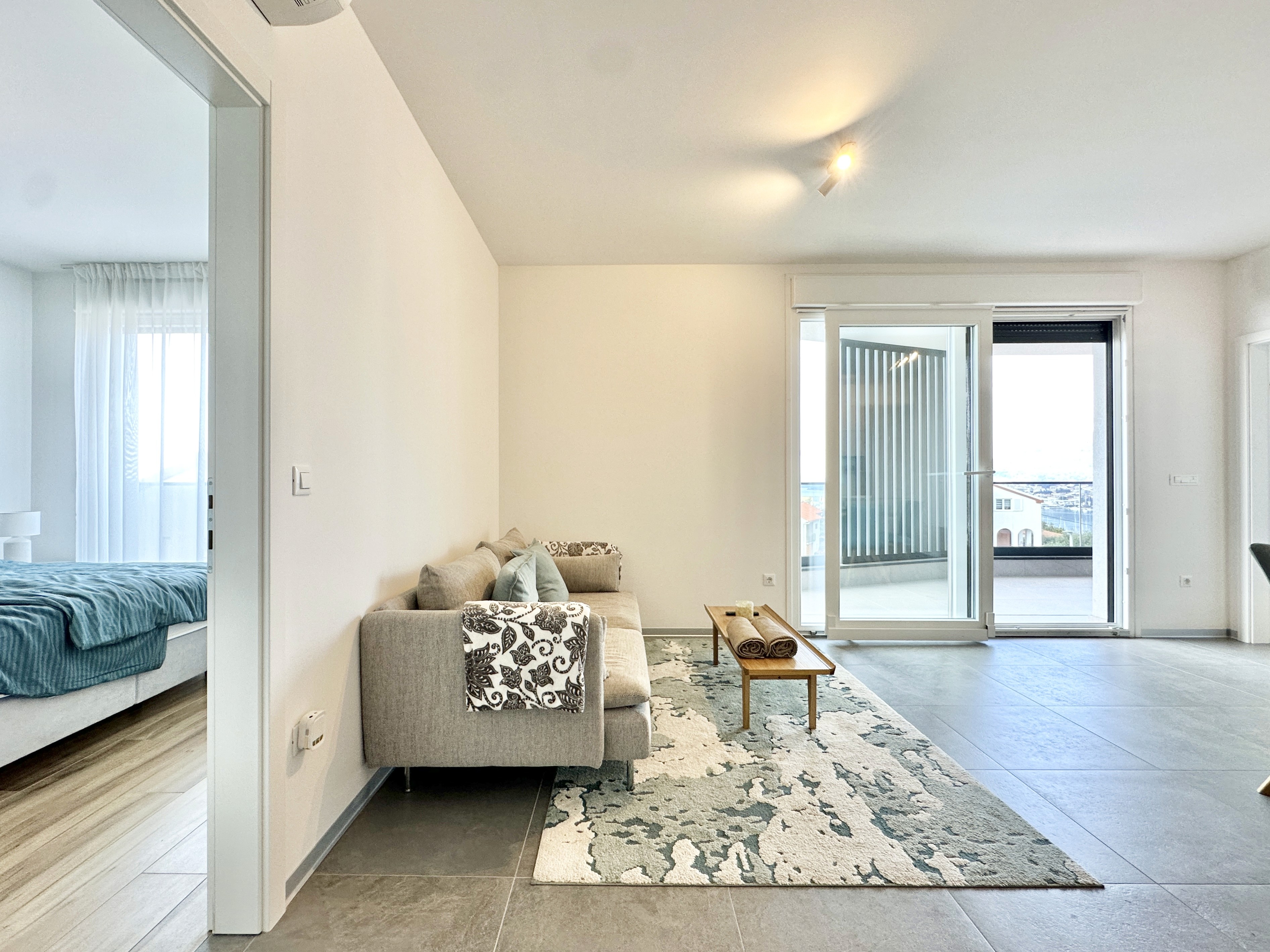 Ornate classic bathroom with claw-foot tub and wood paneling.