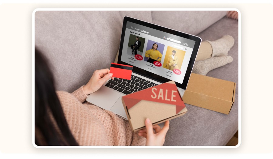 Credit card and a “SALE” shipping box