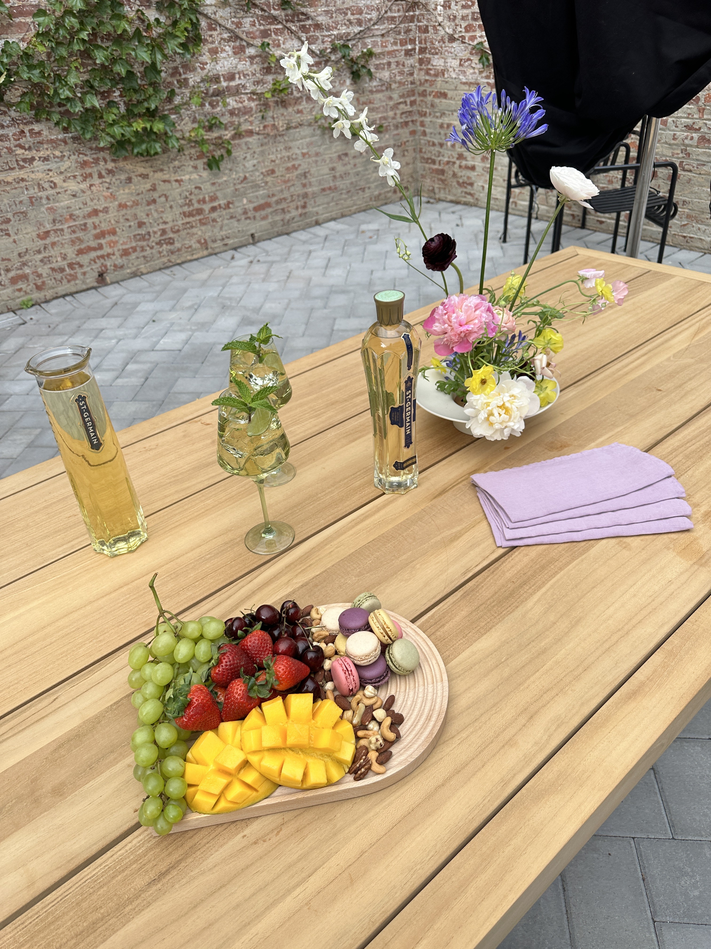 Behind the scenes view of the Avant Garden table being arranged