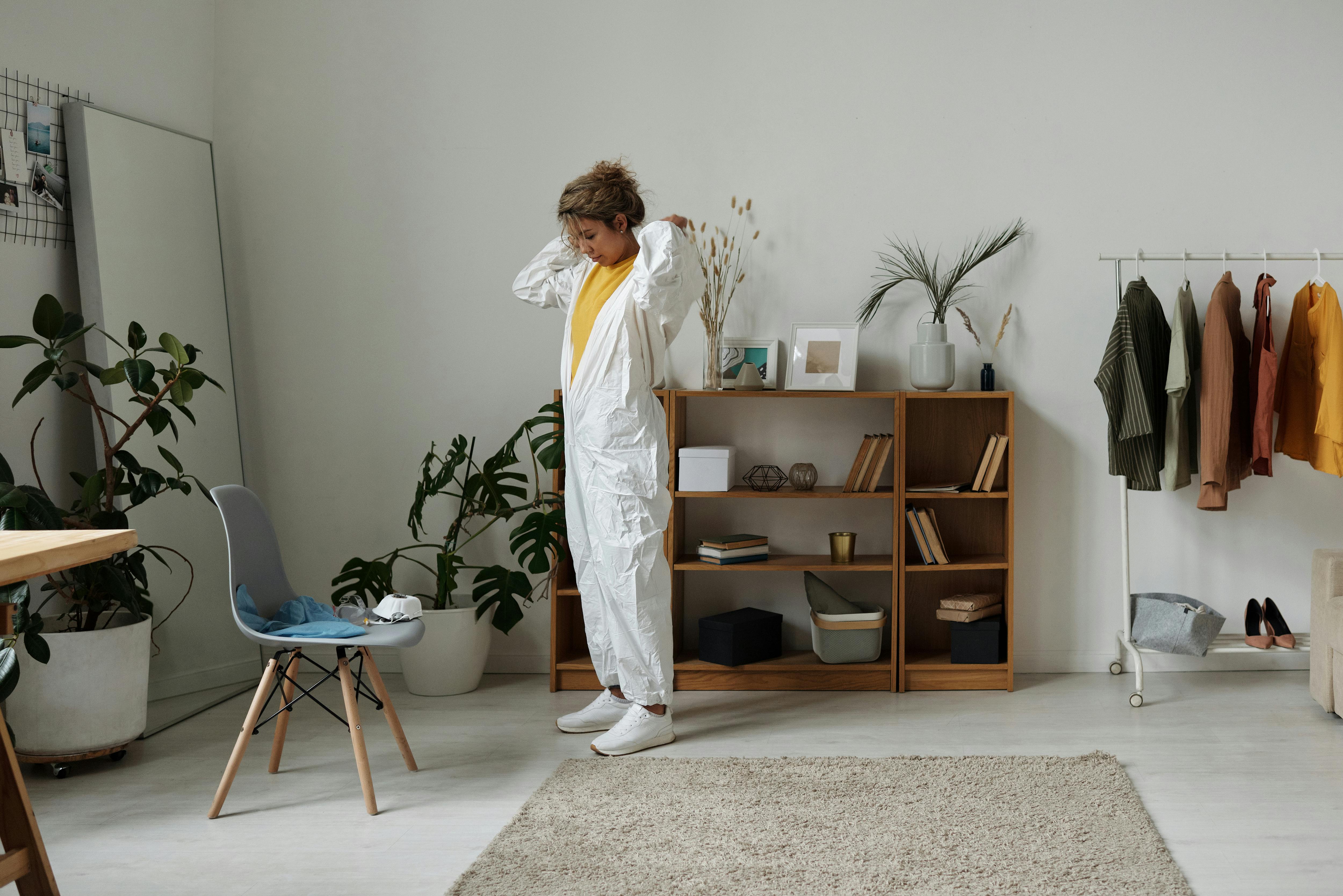 Editorial fashion storefront image for a high-end Framer e-commerce template, featuring a model in a minimalist white jumpsuit.
