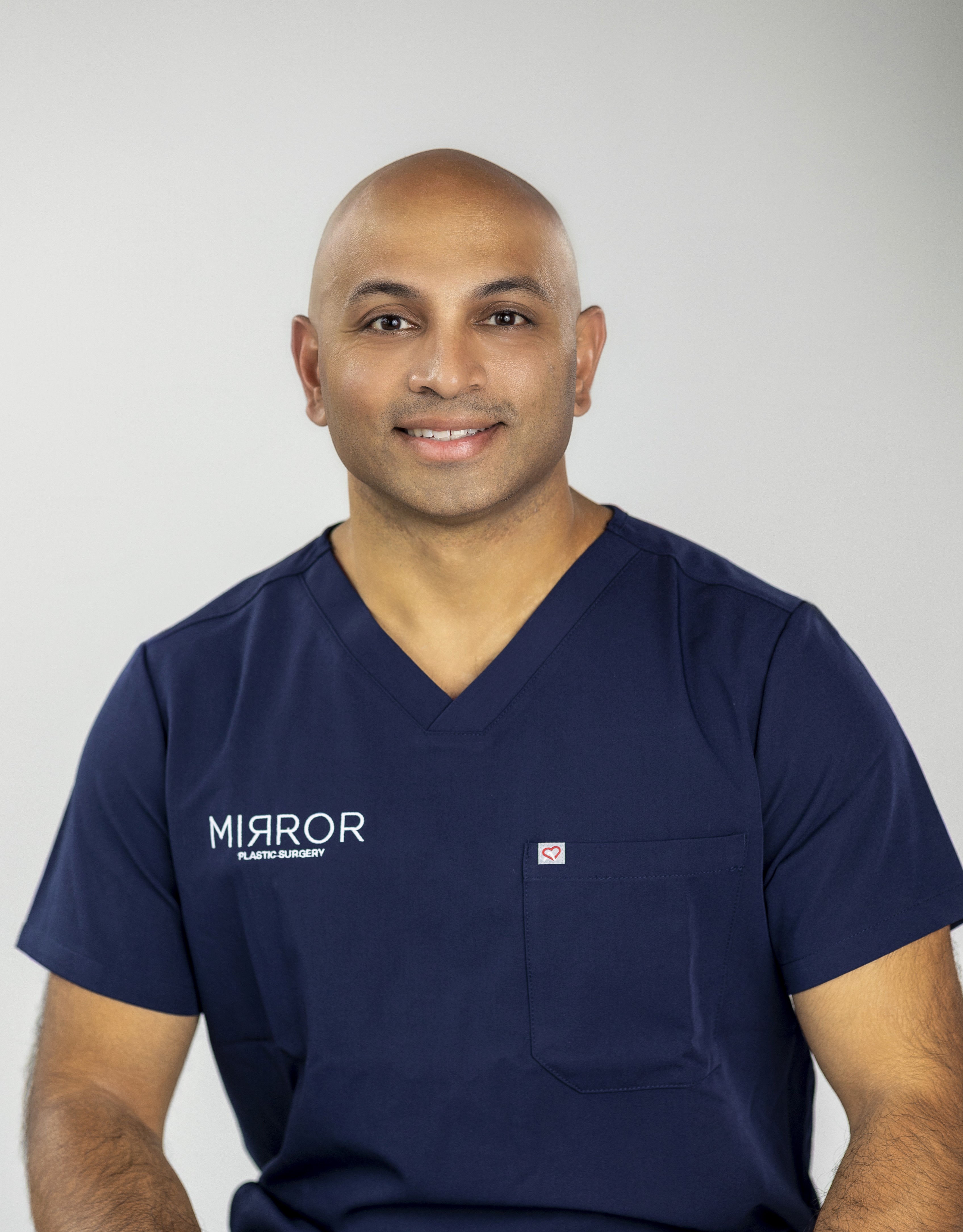 Dr. Akash, Board-Certified Plastic Surgeon
