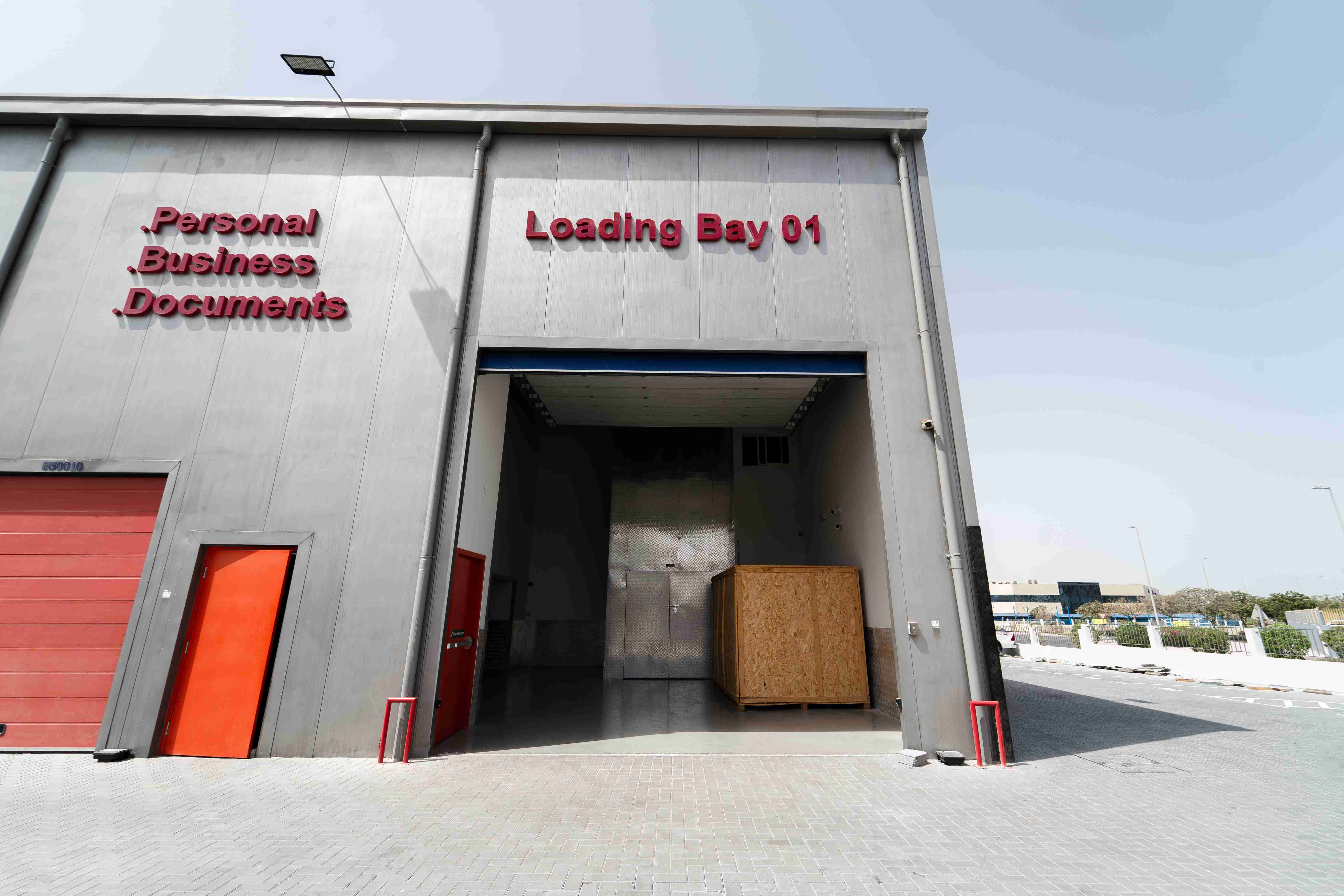 Loading Bay 01 with crates and signage for documents at a secure storage facility Dubai.