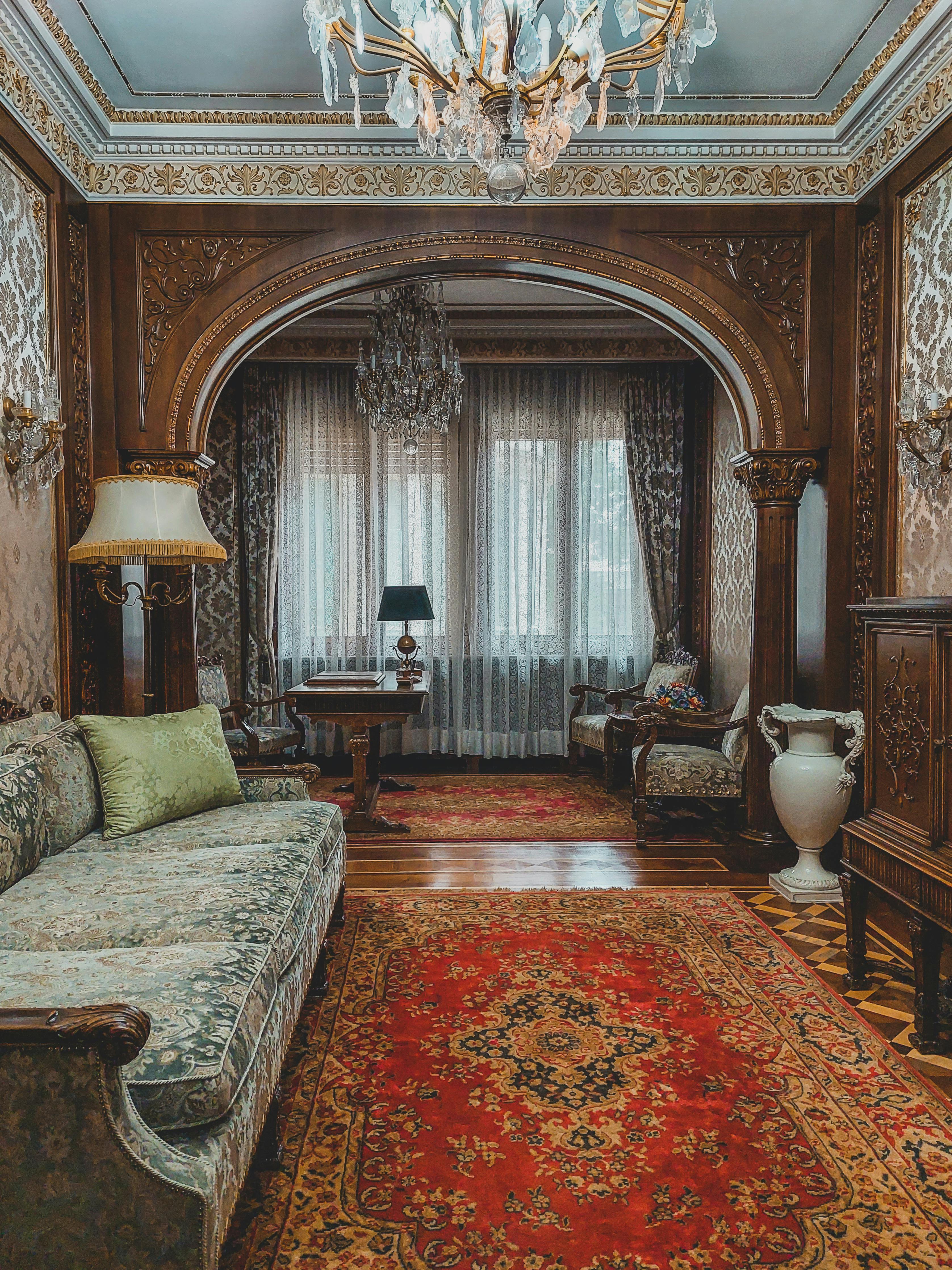 A brown traditional spiral staircase ascending in a classic style.