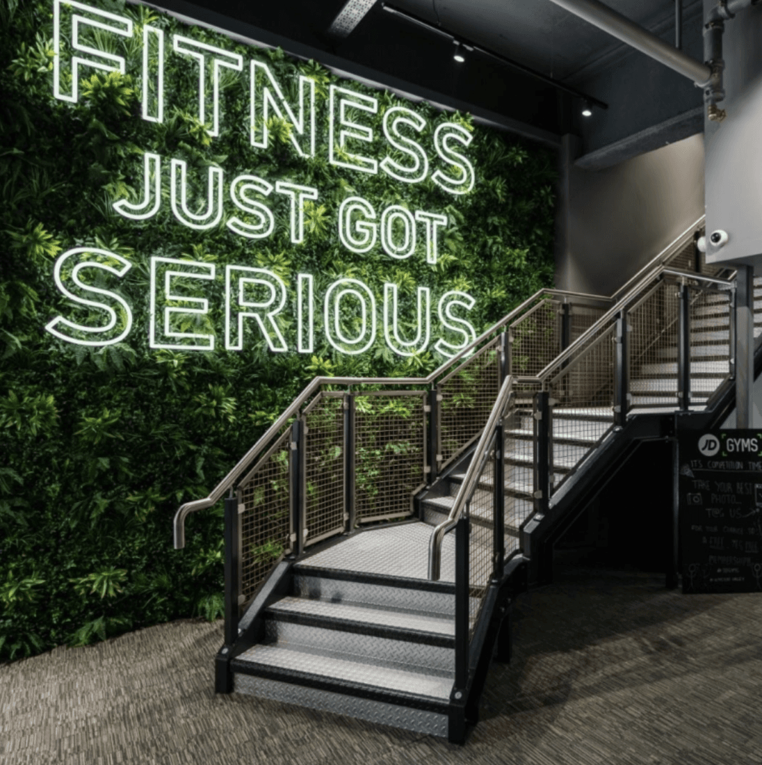 Drone shot of a running track at night