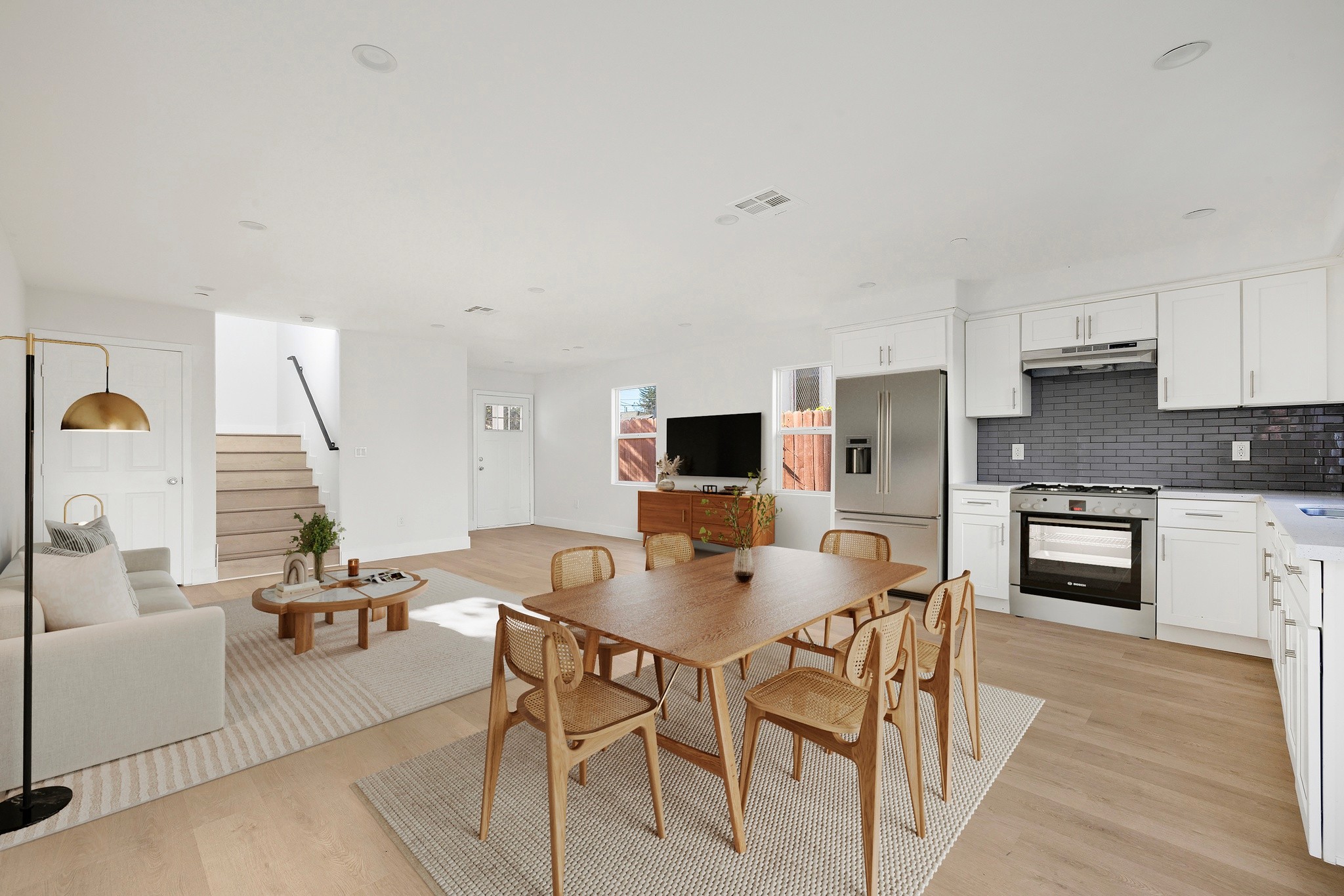 Combined living, dining, and kitchen layout showcasing functional open floor plan at 645 west 97th street.