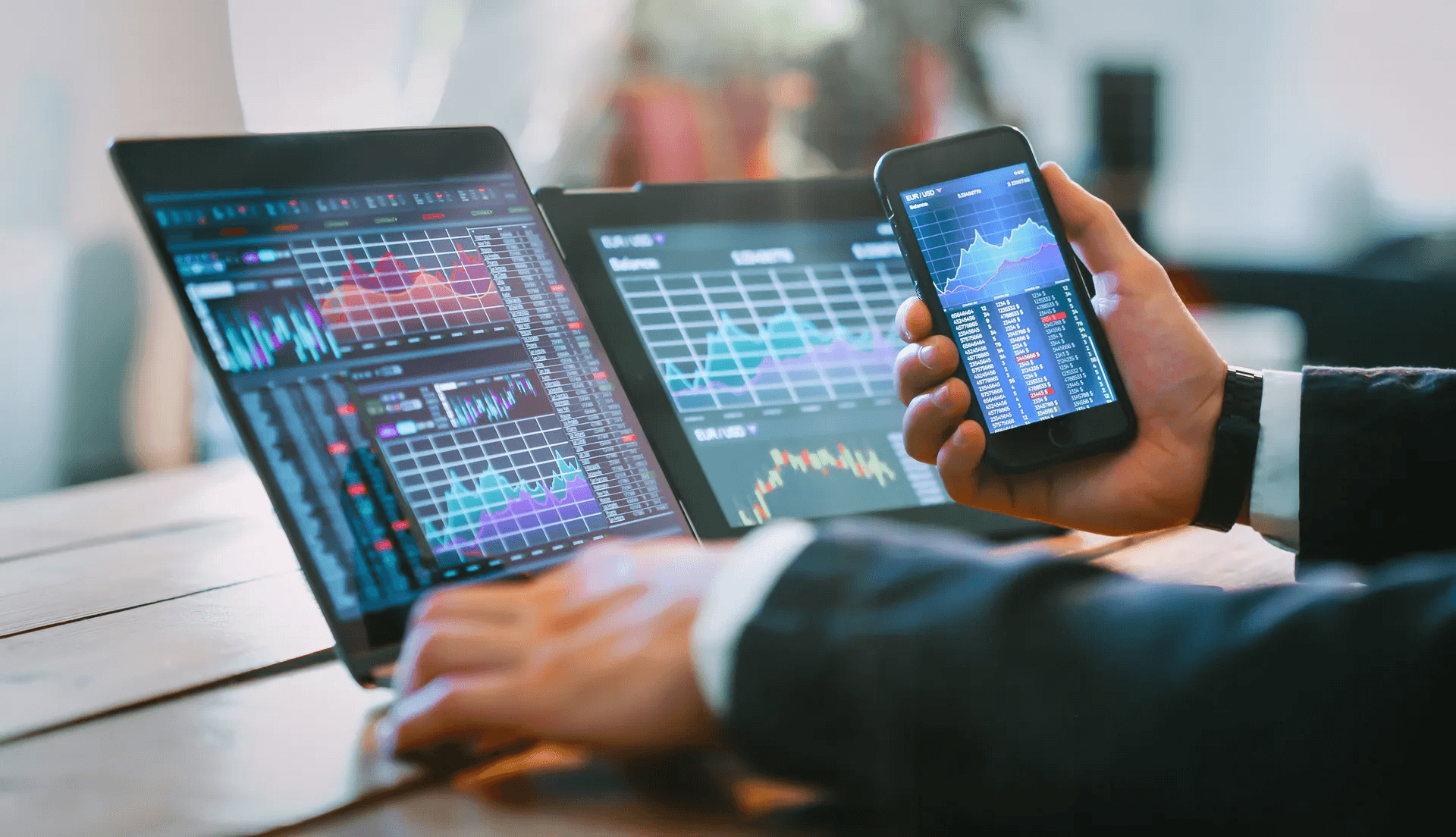  Trader monitoring multiple financial market charts - What Does Onchain Mean in Crypto