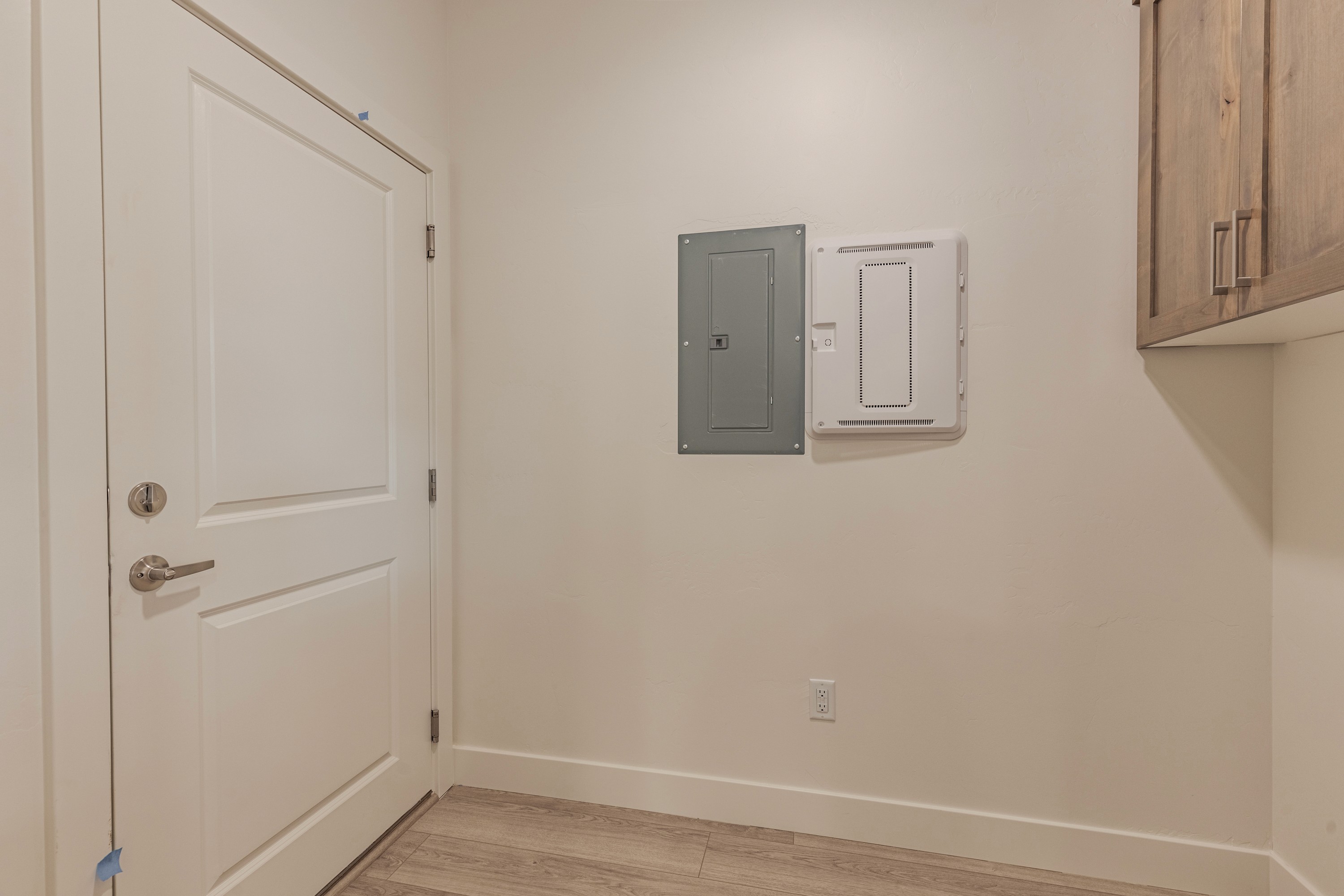 Media panel in the laundry room of the Painted Sands twin home in Hurricane, Utah.
