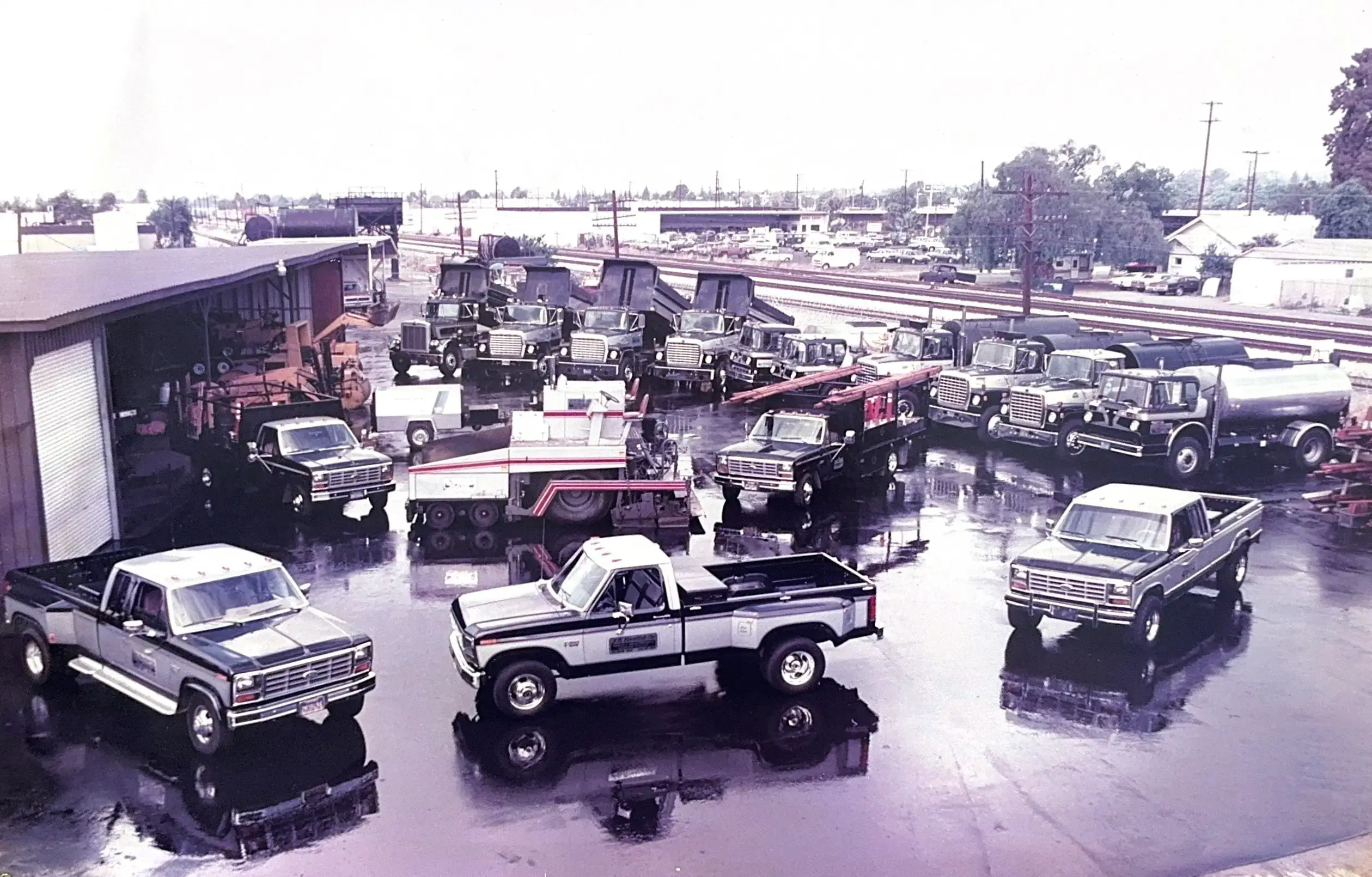 Vintage asphalt paving fleet lineup