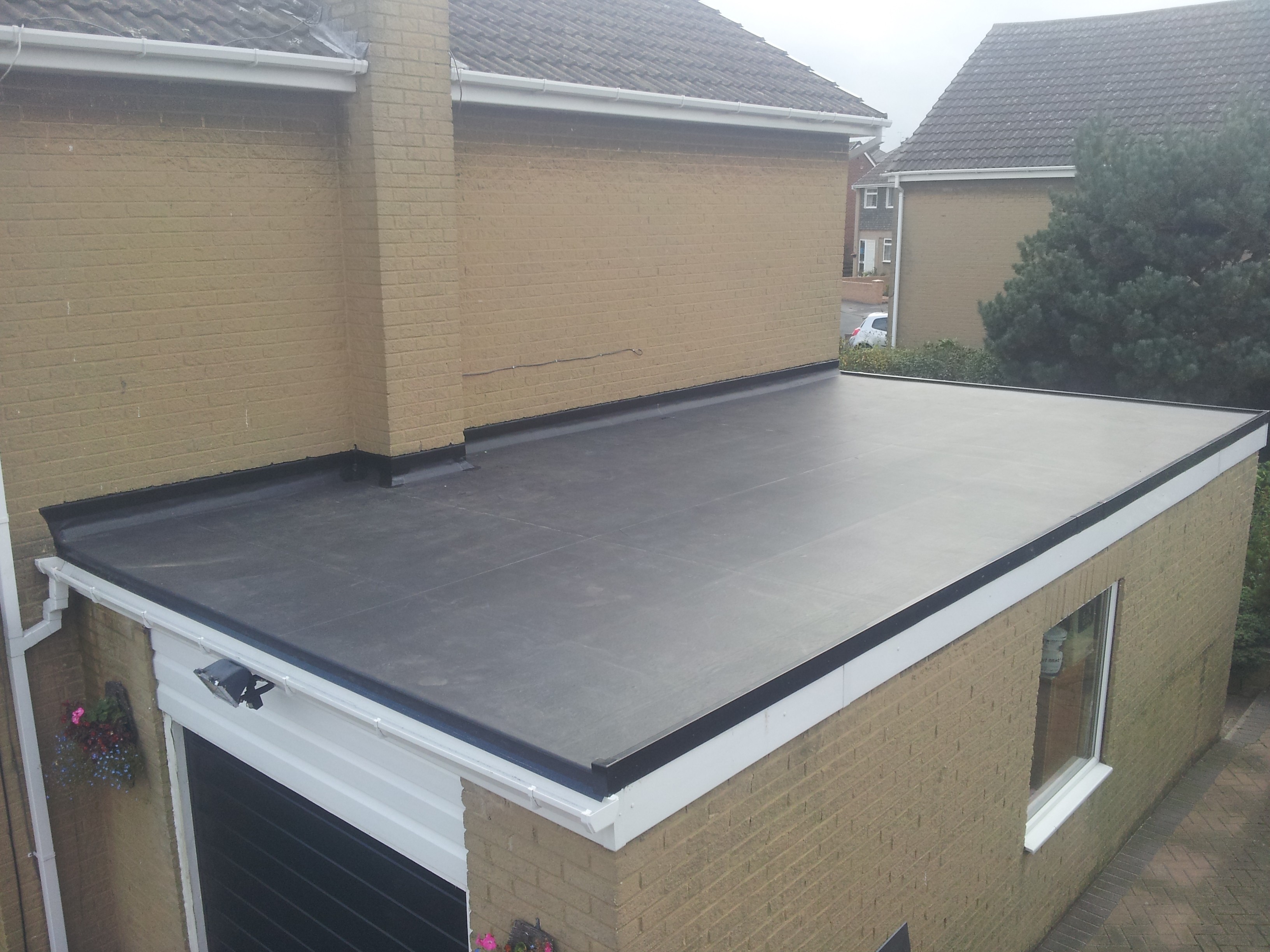 Flat Roofs on Rear Extensions and Garage Roofs