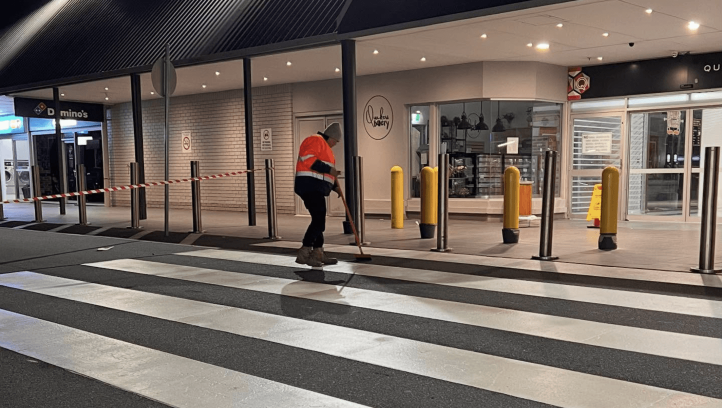 person sitting in a chair in front of a man