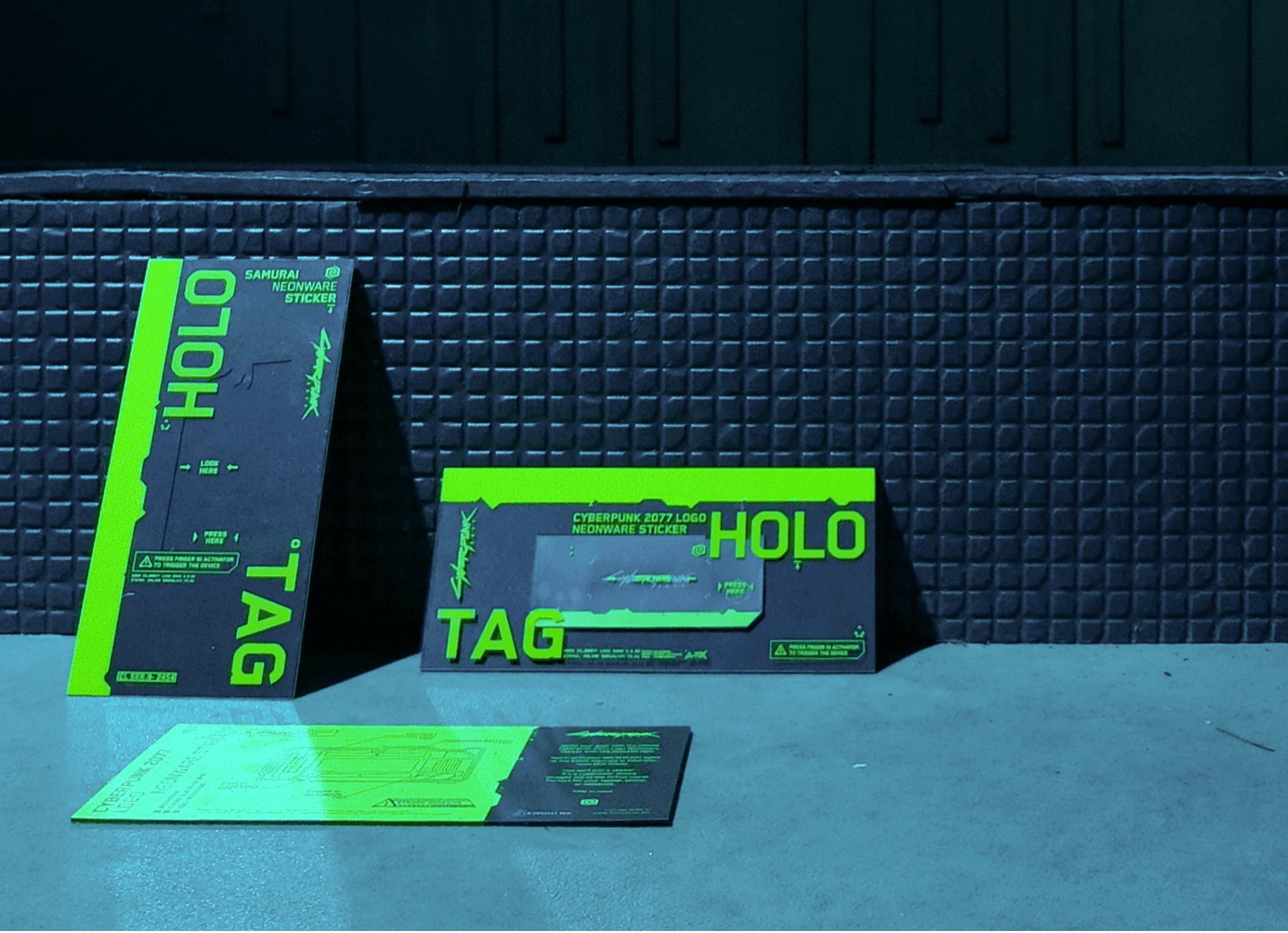 A large group photo of diverse team members gathered in an industrial-style space with arched ceiling.