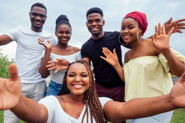 three children at the beach during golden hour