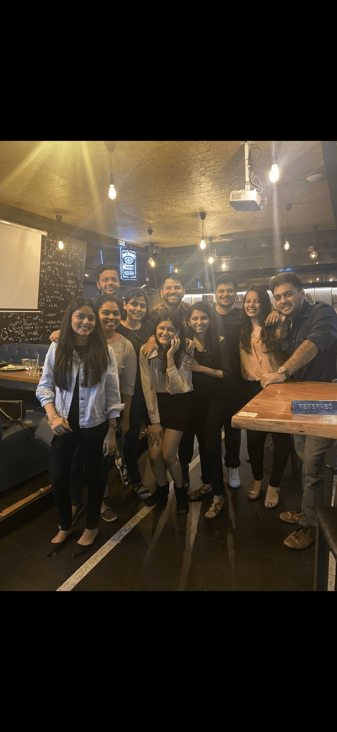 Modern buildings with geometric patterns against dark sky