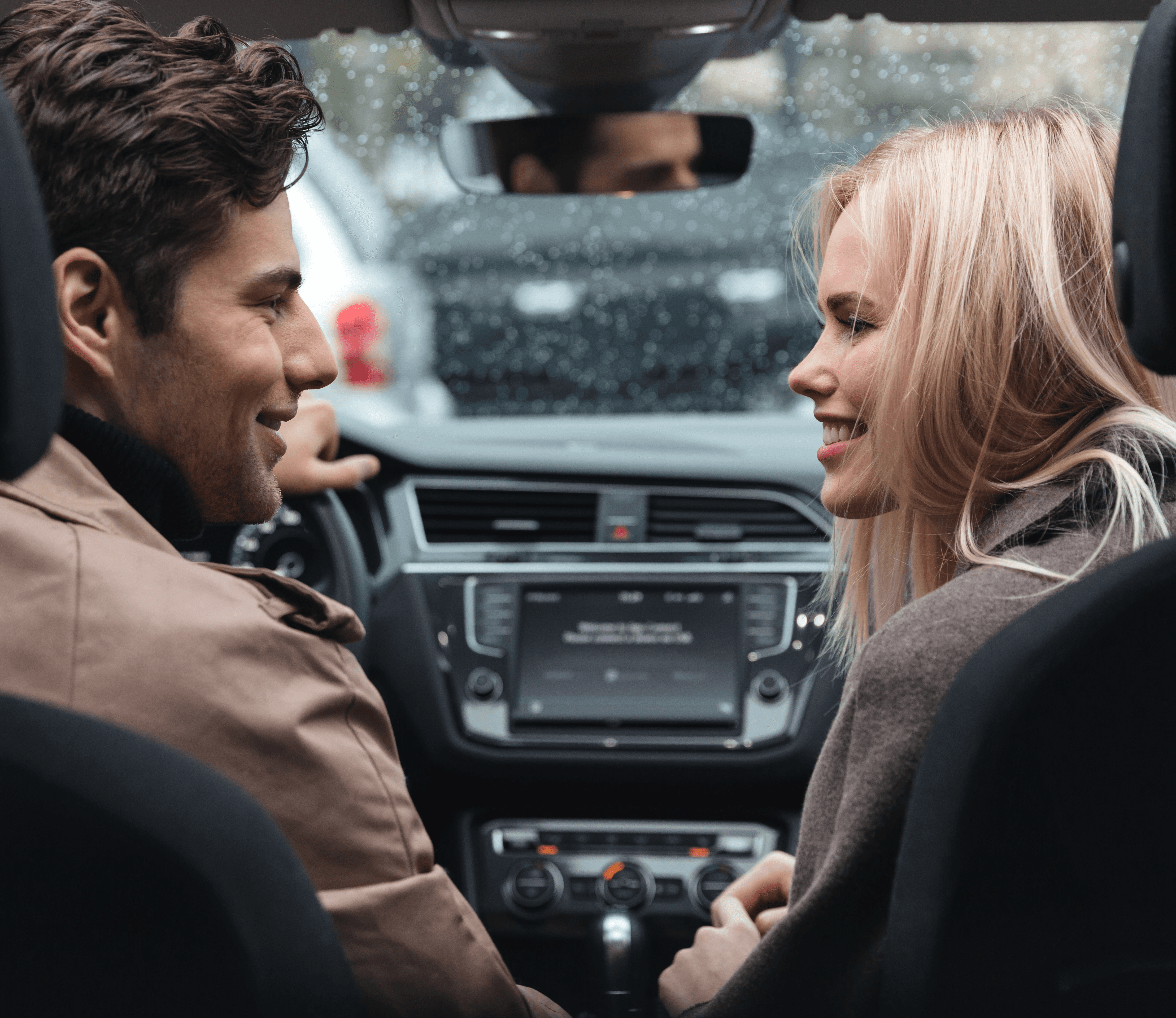 Collection of luxury sports cars displayed in modern rental showroom