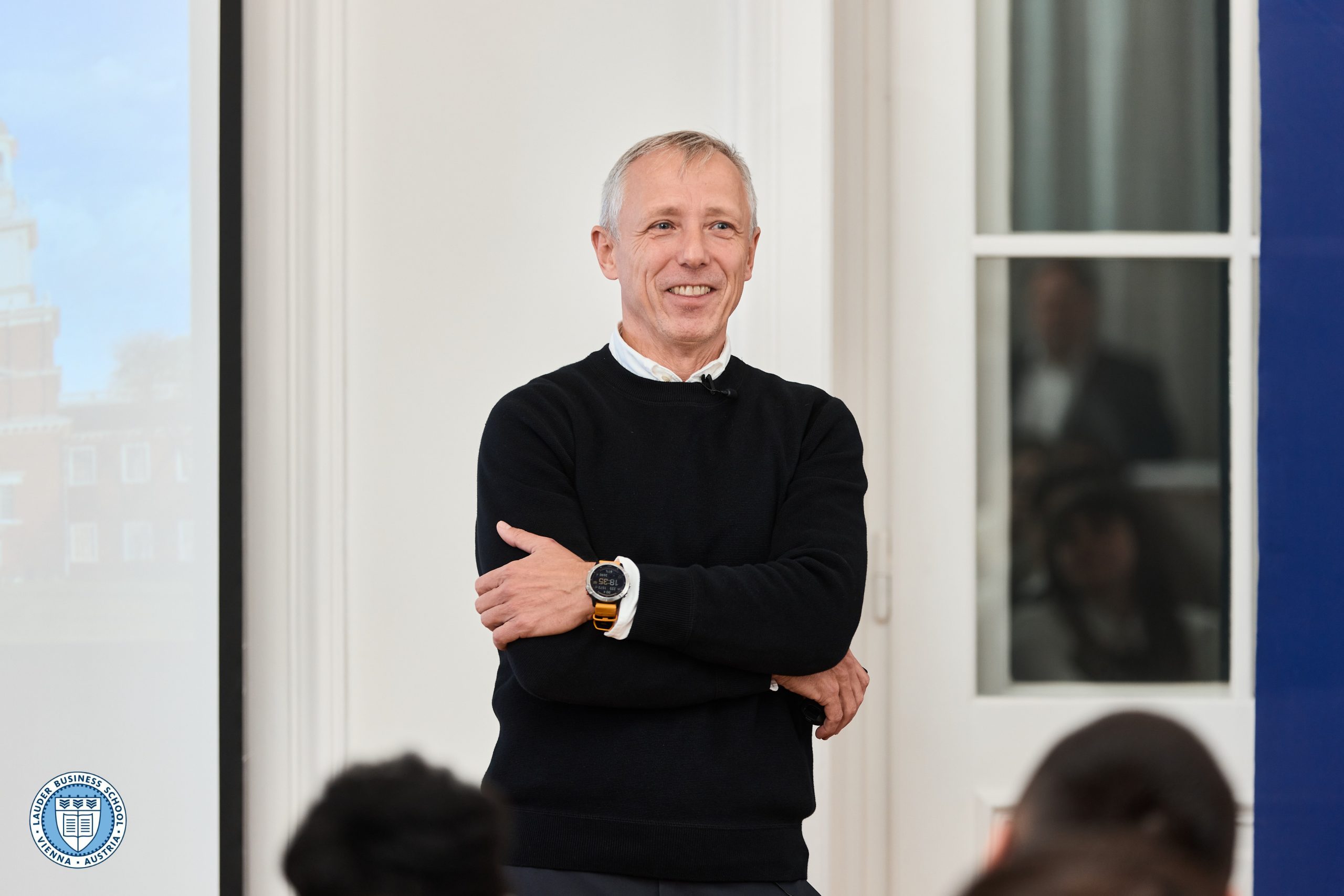  Wolfgang Platz, founder of Tricentis and Katharo Ventures, together with Dr. Tamas Csermely, Director of Graduate Programs at LBS, in front of LBS students