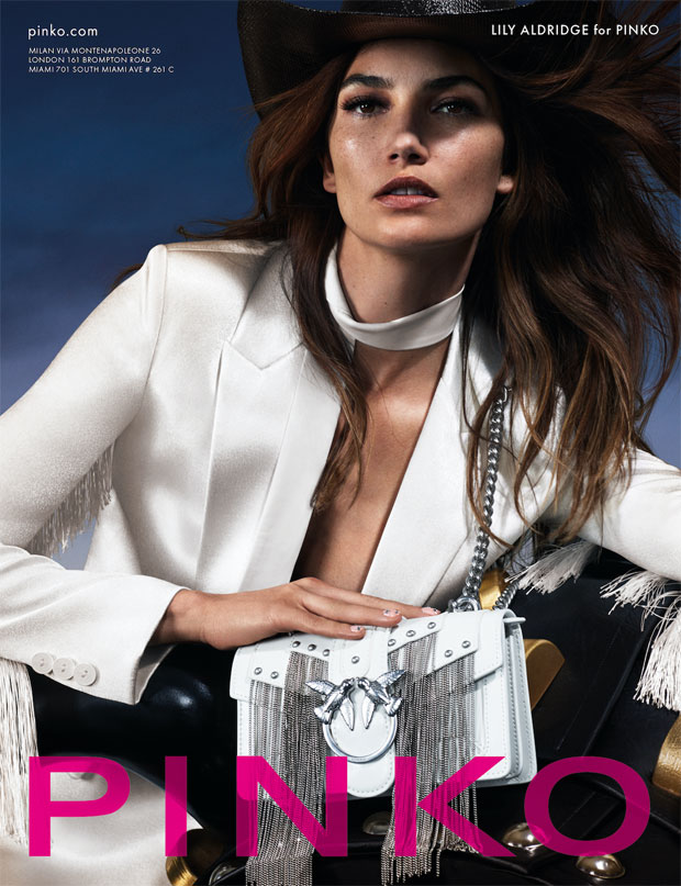 PINKO advertising campaign featuring Lily Aldridge in white structured blazer with signature Love Bag showcasing brand's sophisticated contemporary aesthetic with international store locations displayed - global brand positioning and multi-market digital activation managed by Alessandro Brancati Marketing & Growth Studio during pandemic crisis