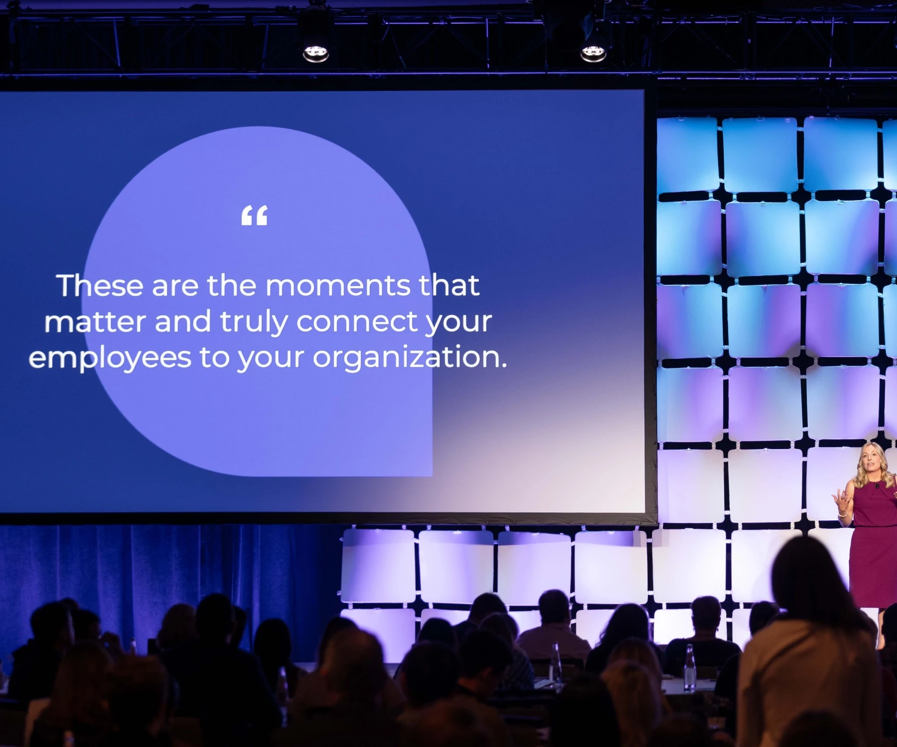 Attune summit photography with CEO on stage