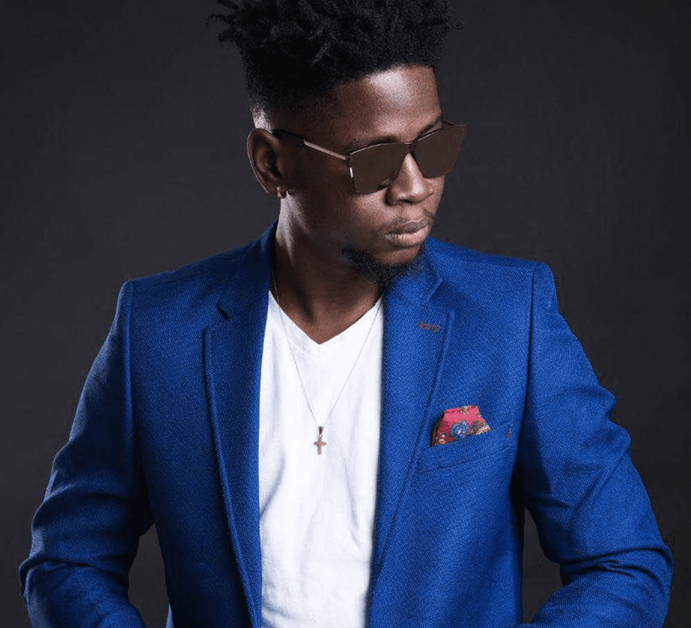 Woman with windblown short hair.