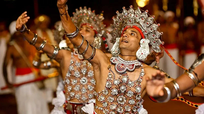 Traditional Kandyan dancers in ornate headdresses