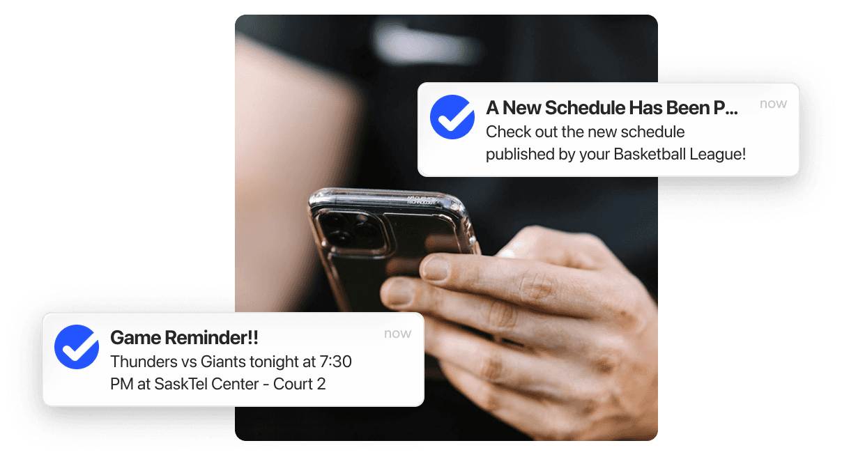 Person receiving a TeamLinkt push notification on their phone with a basketball game schedule reminder
