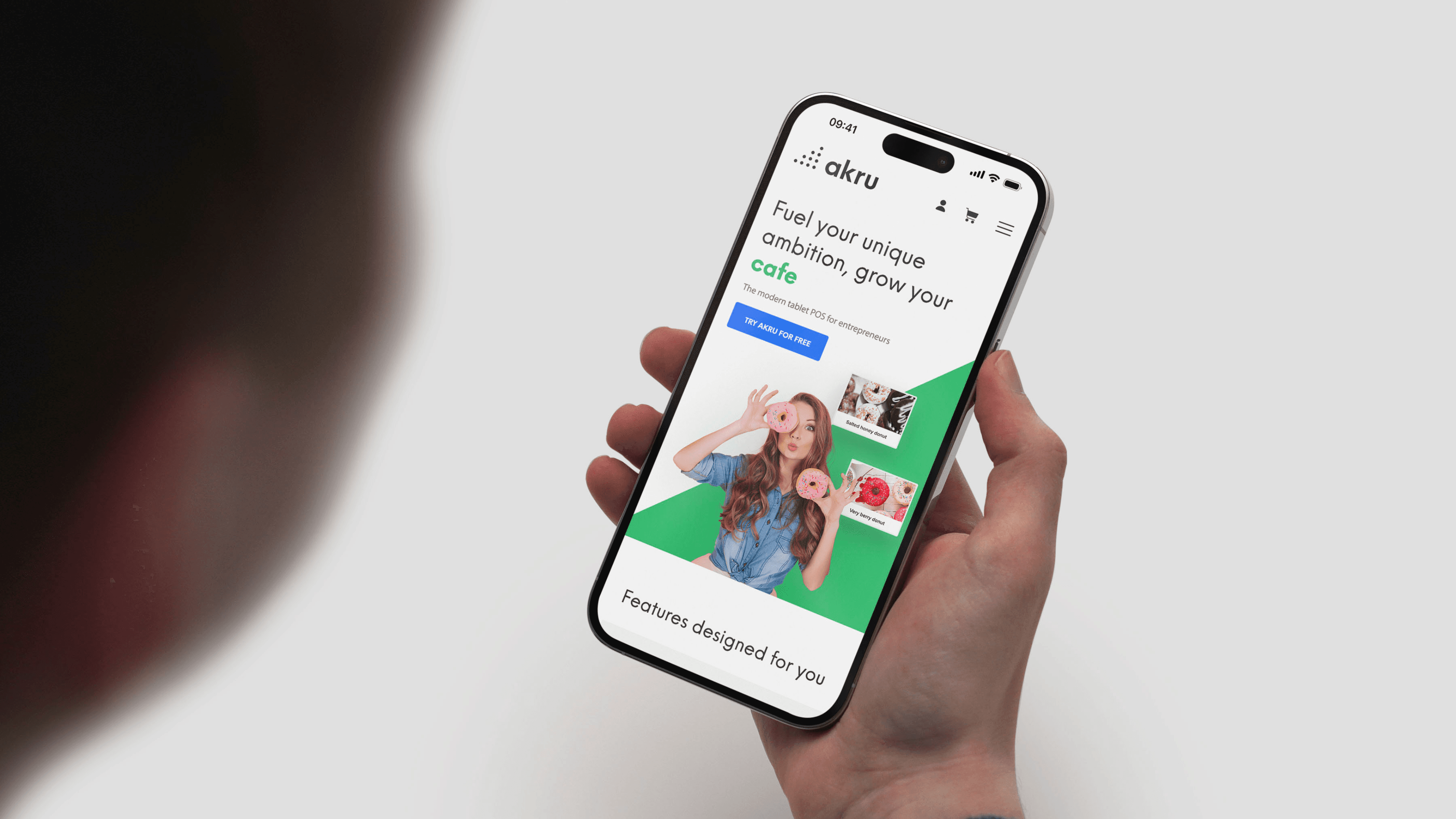 Mobile view of Akru POS marketing site highlighting features and value for cafés and small business owners