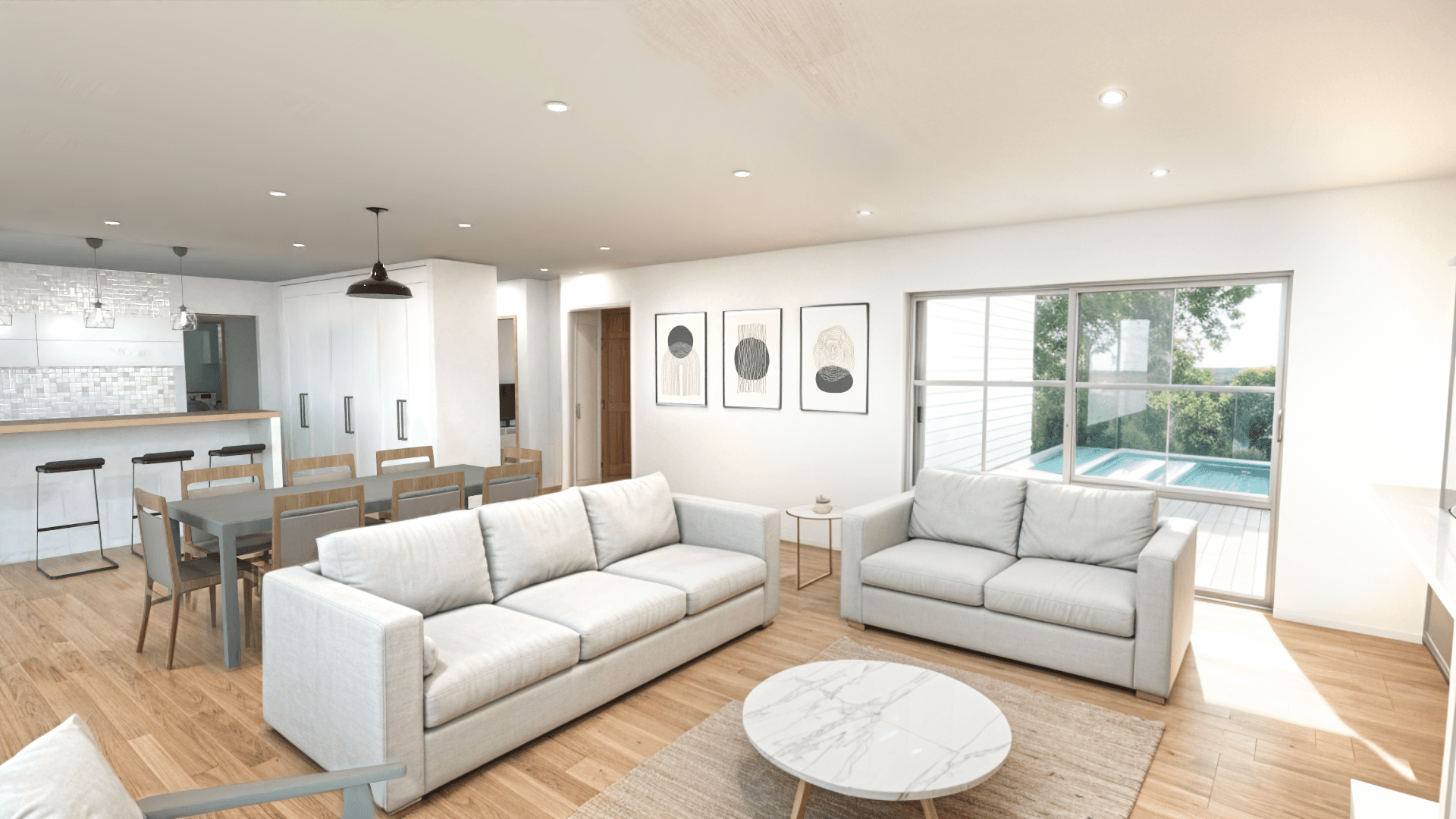 Bright living room with large windows, neutral furniture, and an open layout connecting to the dining area and kitchen.