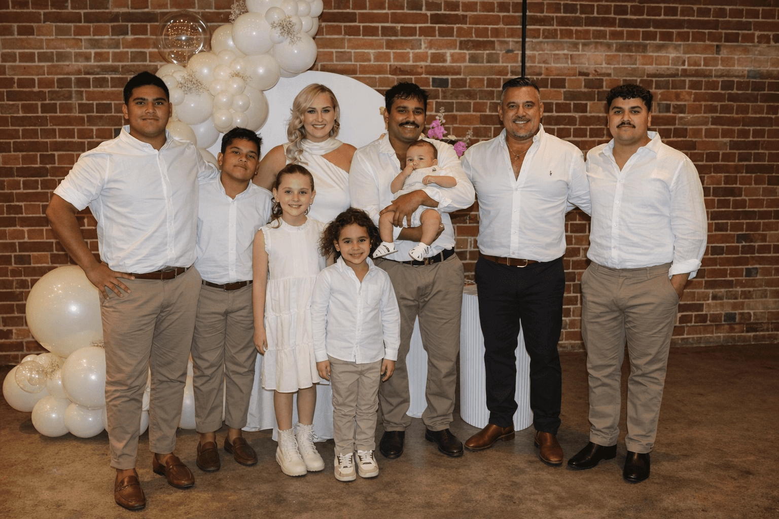 a large rock with a tree on top of it