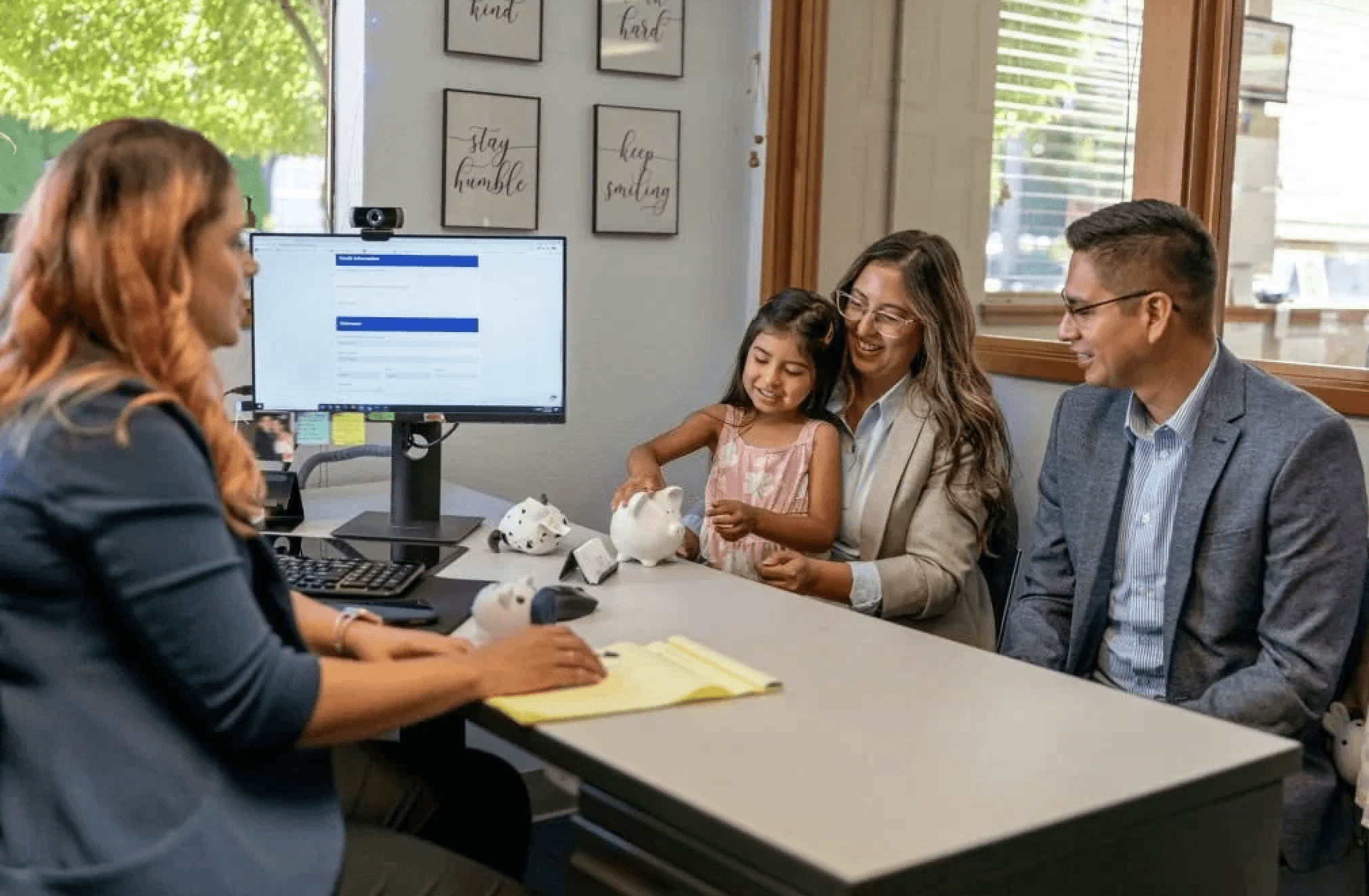 family meets with a woman in her office