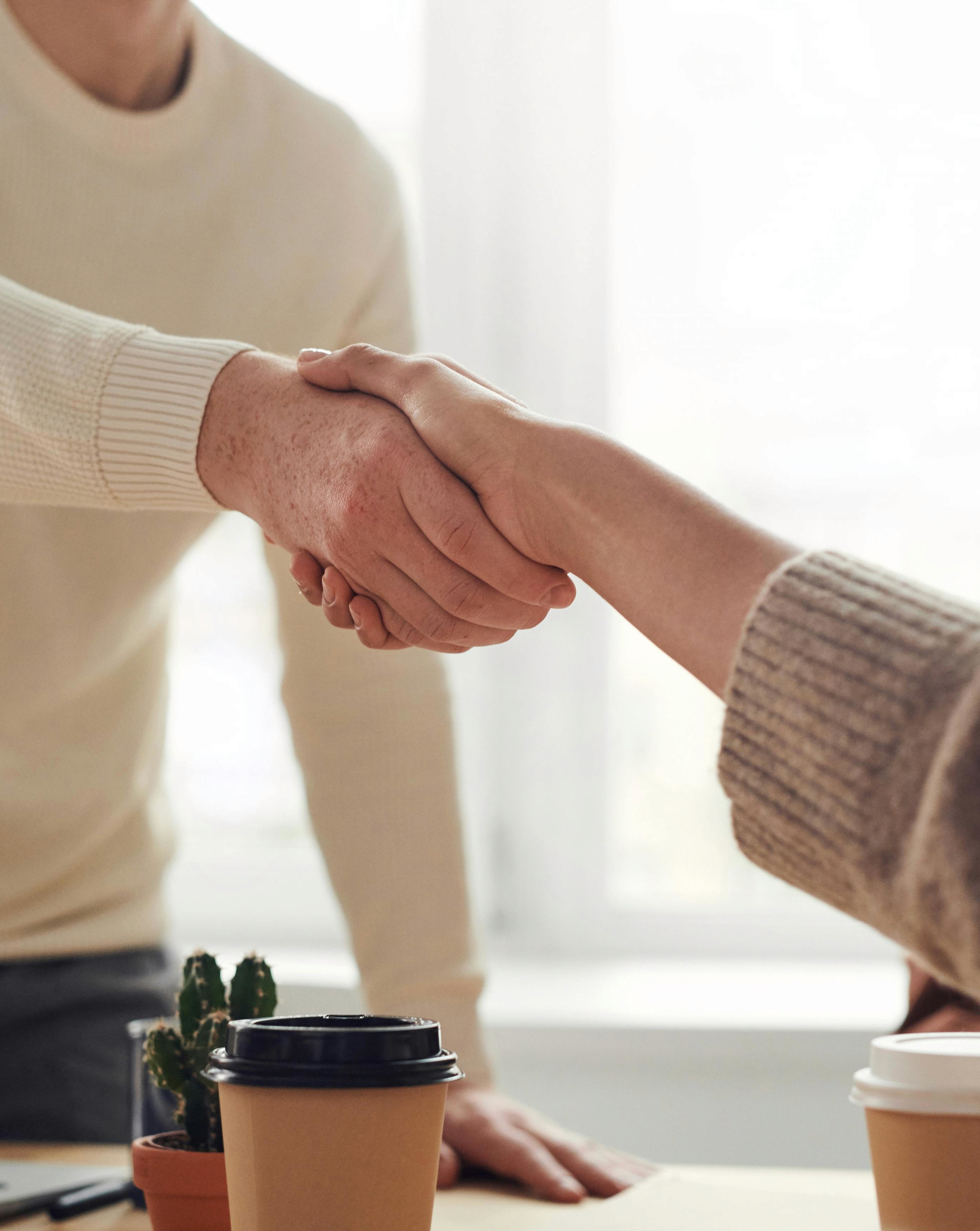 person making a contactless payment with a card