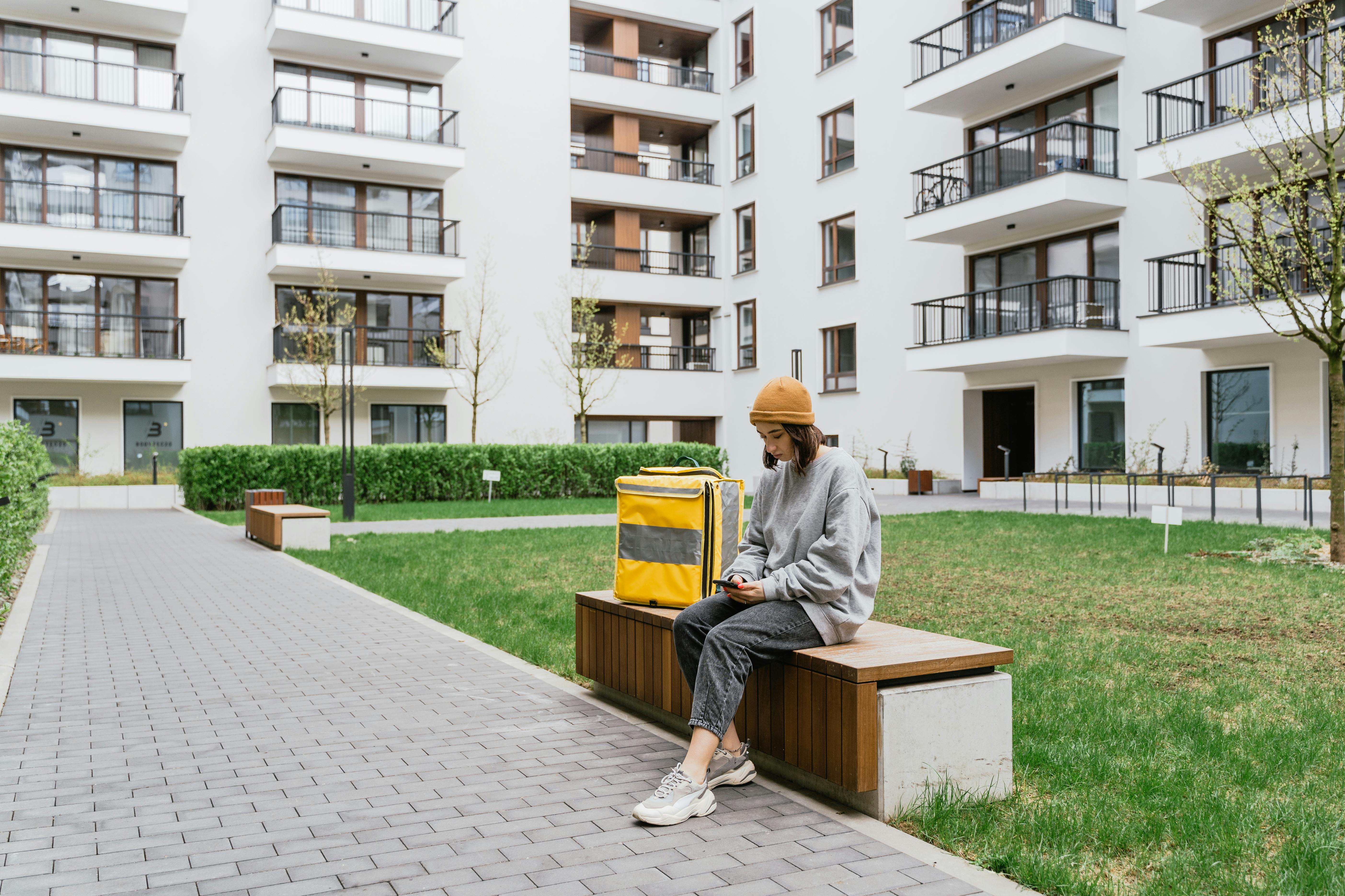 A girl in a park in an apartment complex