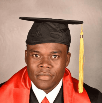 Young person with short, tousled blonde hair wearing an oversized, vibrant orange turtleneck sweater against a soft grey background, conveying a cool, modern look.