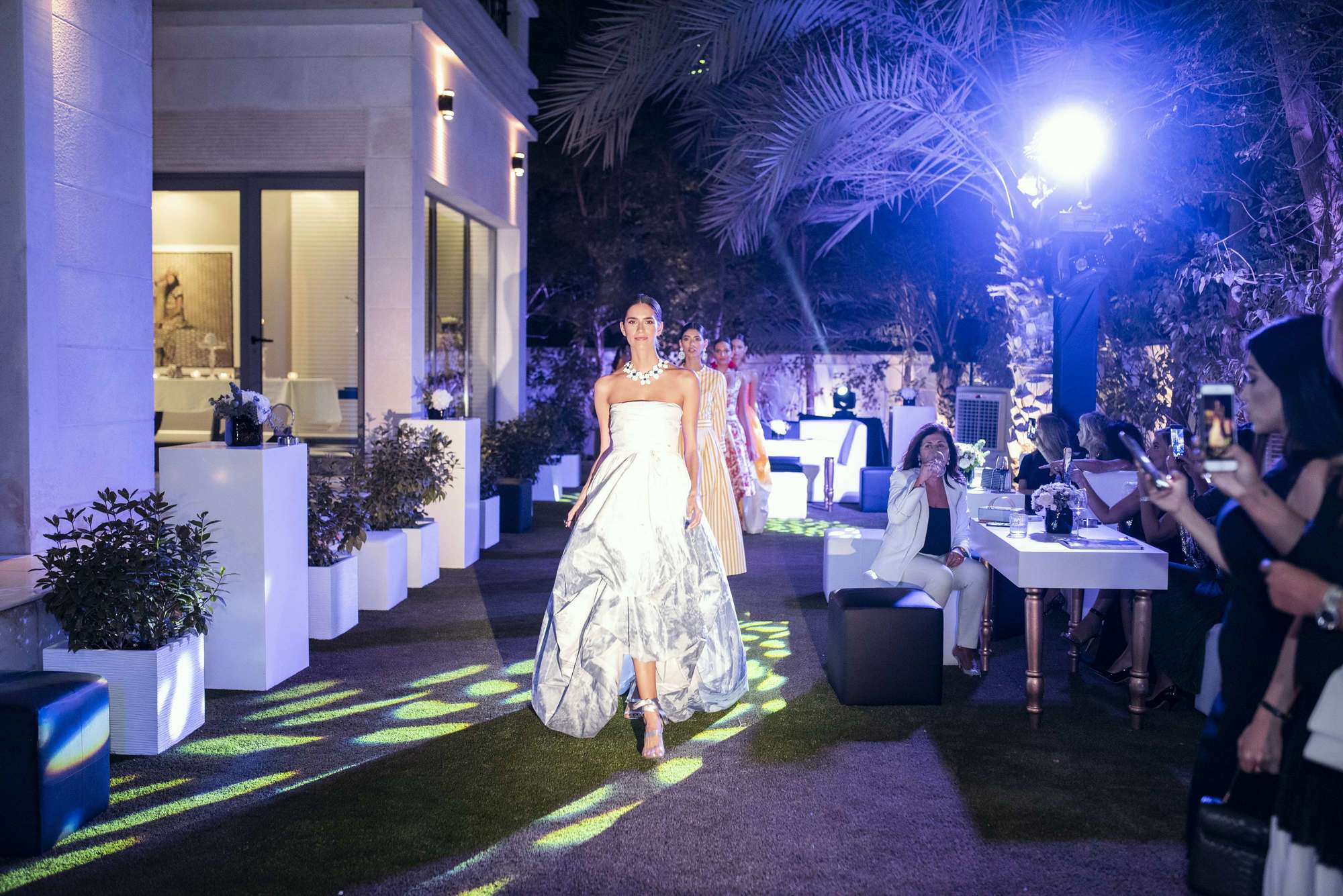 Ladies walking on the cat walk showing Oscar de la Renta collection : Oscar de la Renta x MOJEH Magazine Collection Event | Relity Group