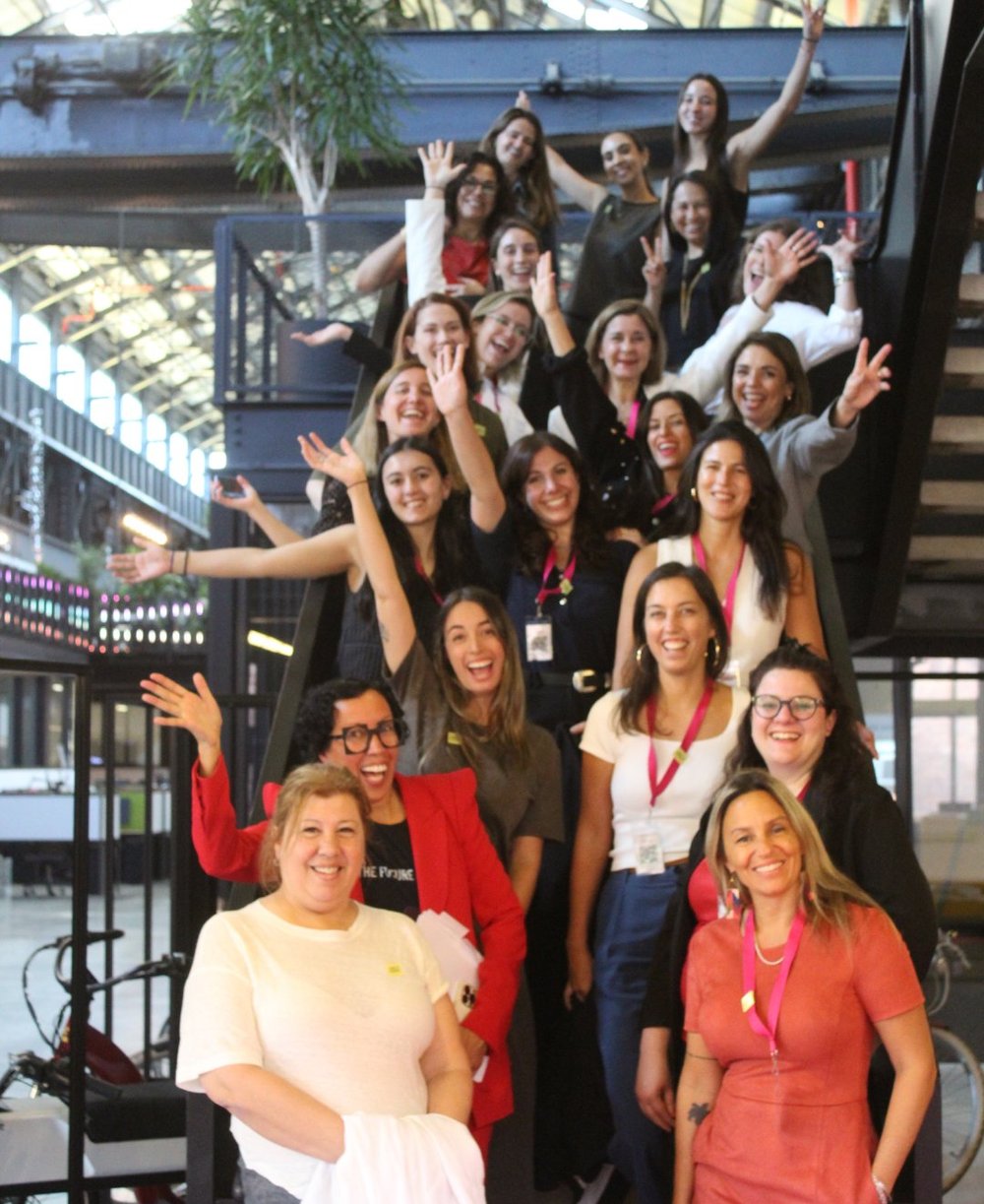 Group shot of attendees on a flight of stairs