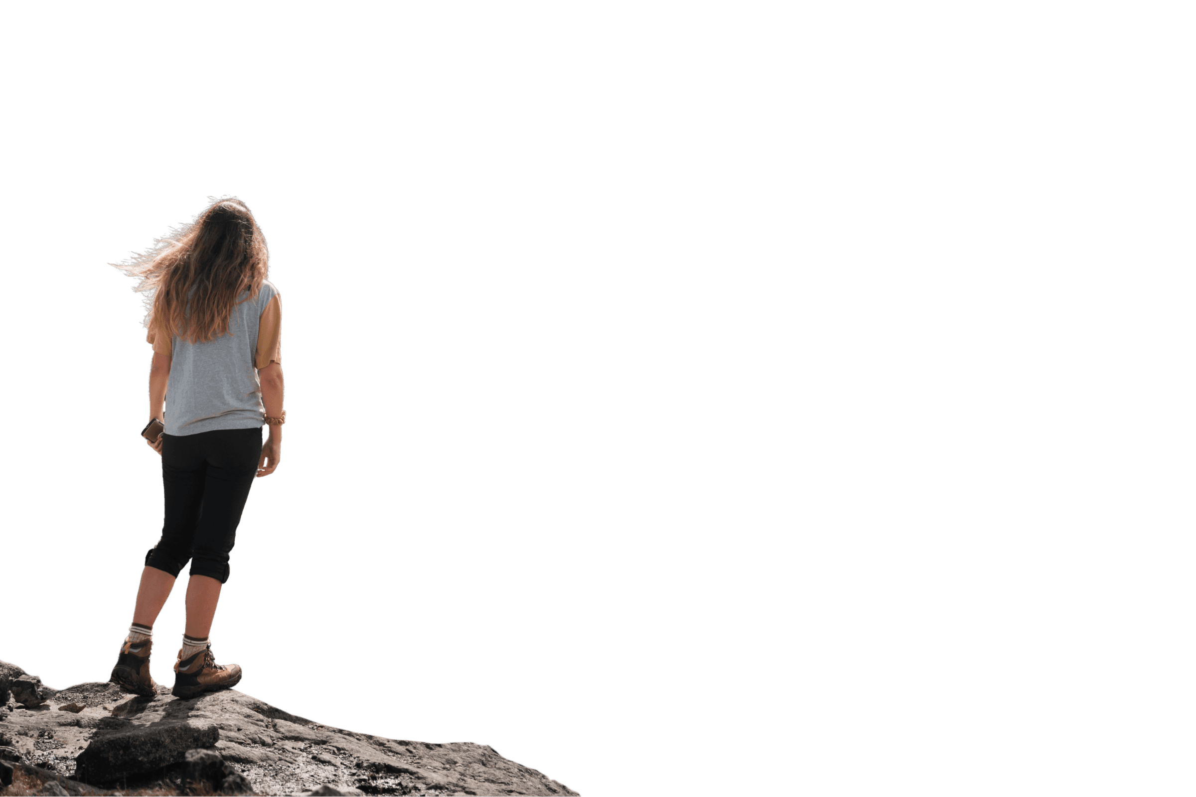 woman standing in mountain edge