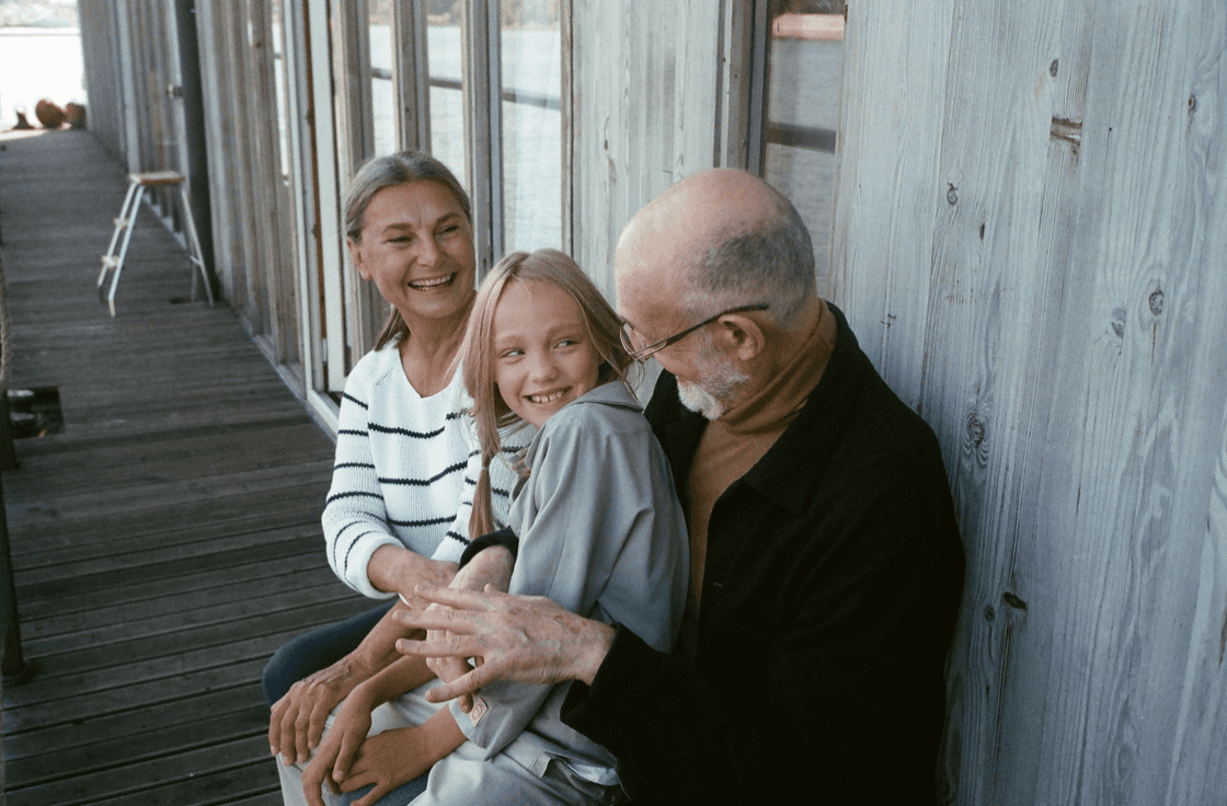 grandparents with granddaughter