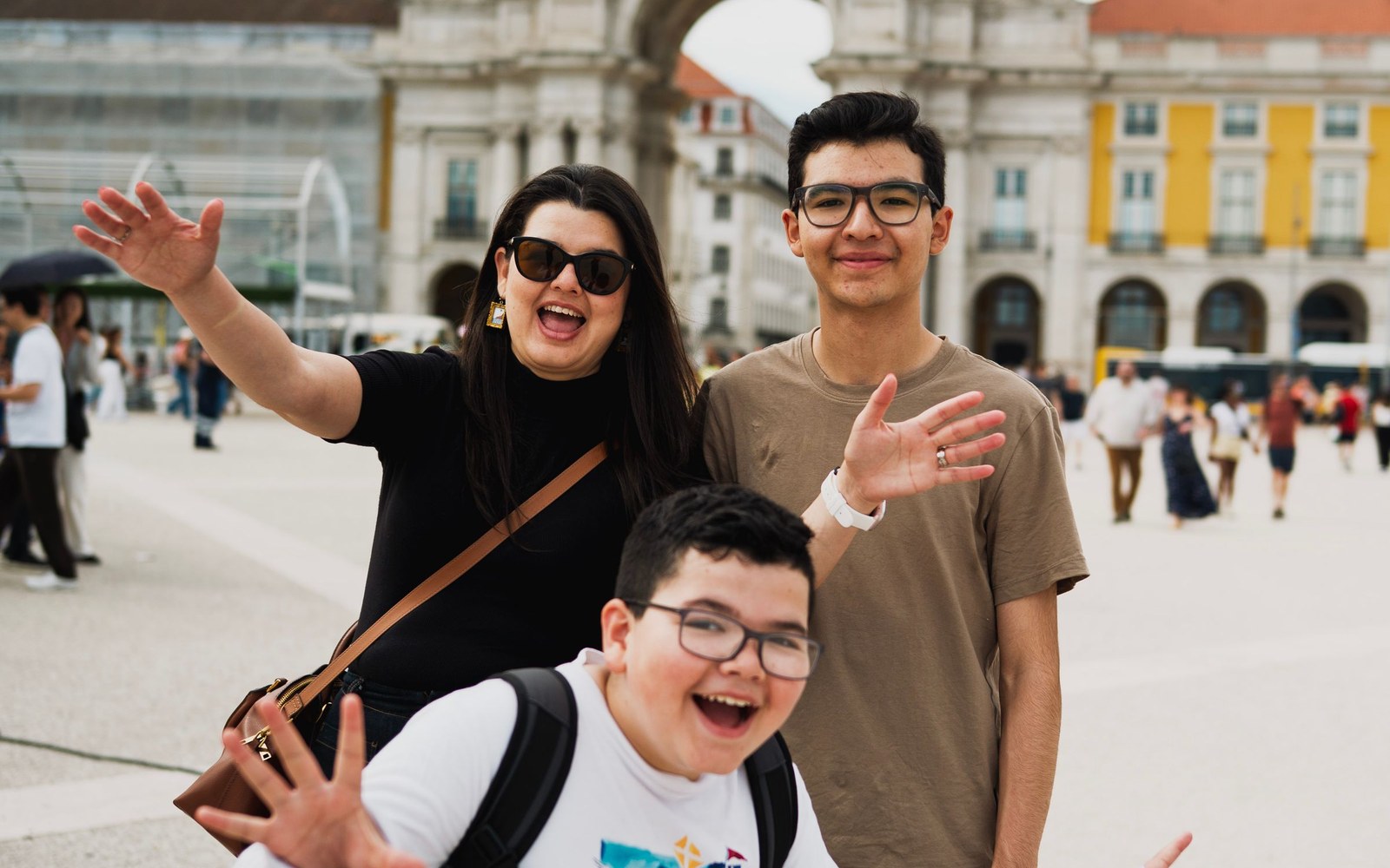 Visitors enjoying Praça do Comércio in Lisbon