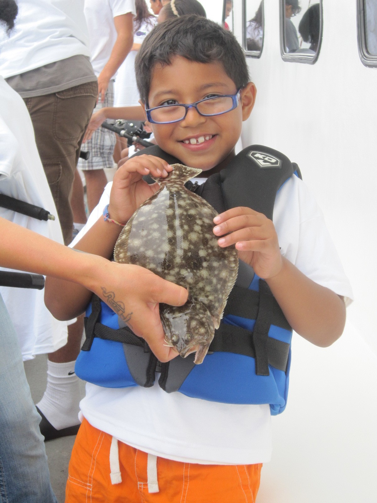 Kids fishing at Ty's Reef