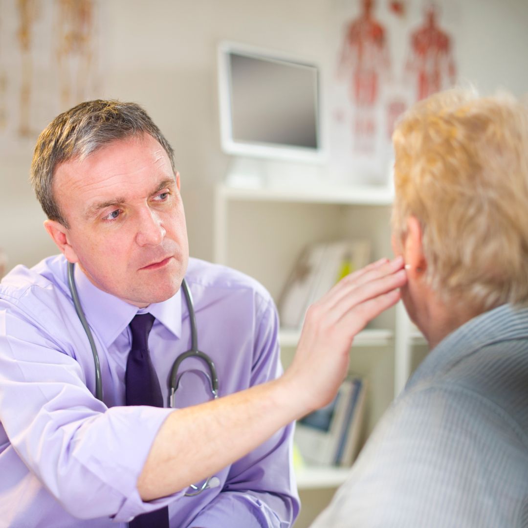 ear doctor inspecting patient