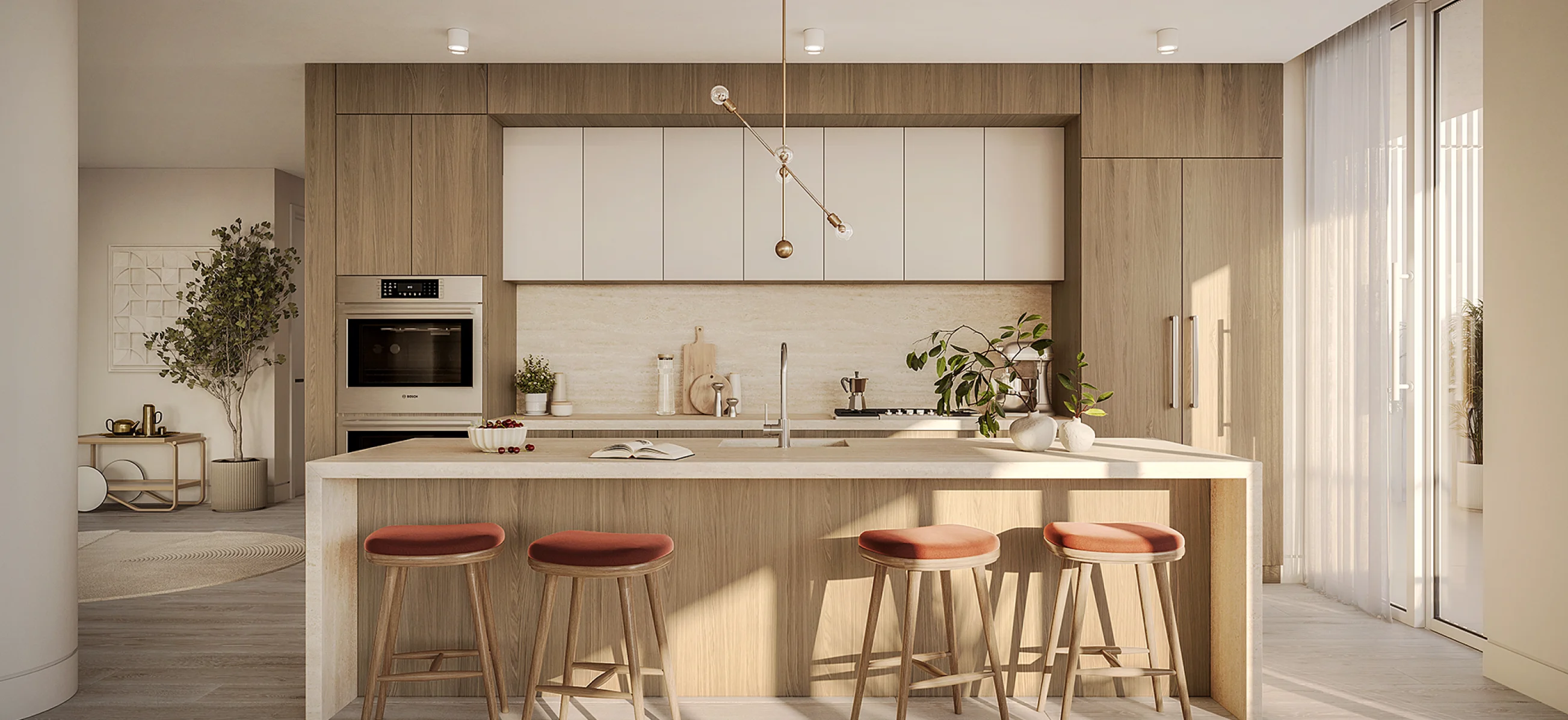 A contemporary kitchen featuring a spacious island with stools, showcasing a sleek and functional design.