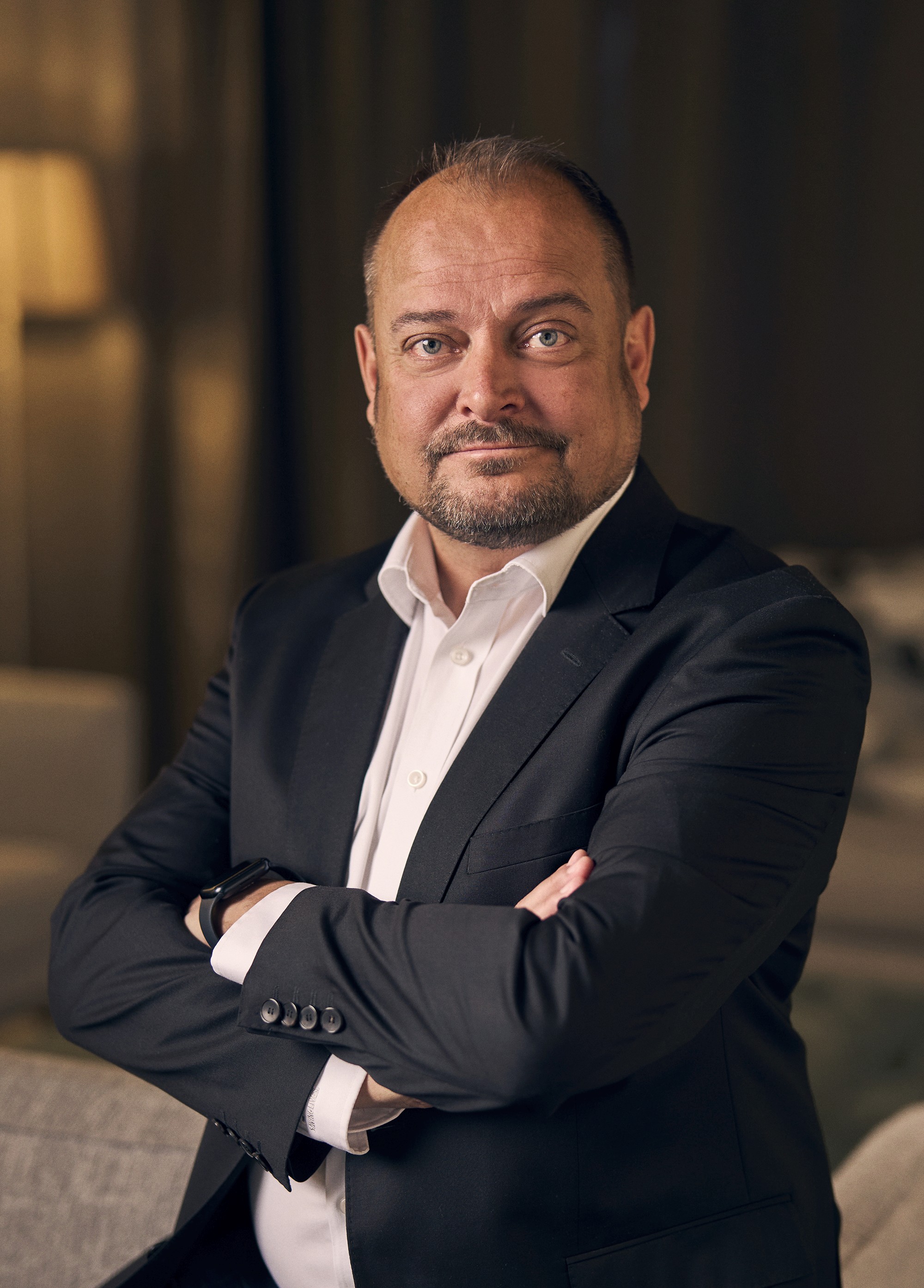 Portrait of John Doe Anderson, CEO of Omnis.